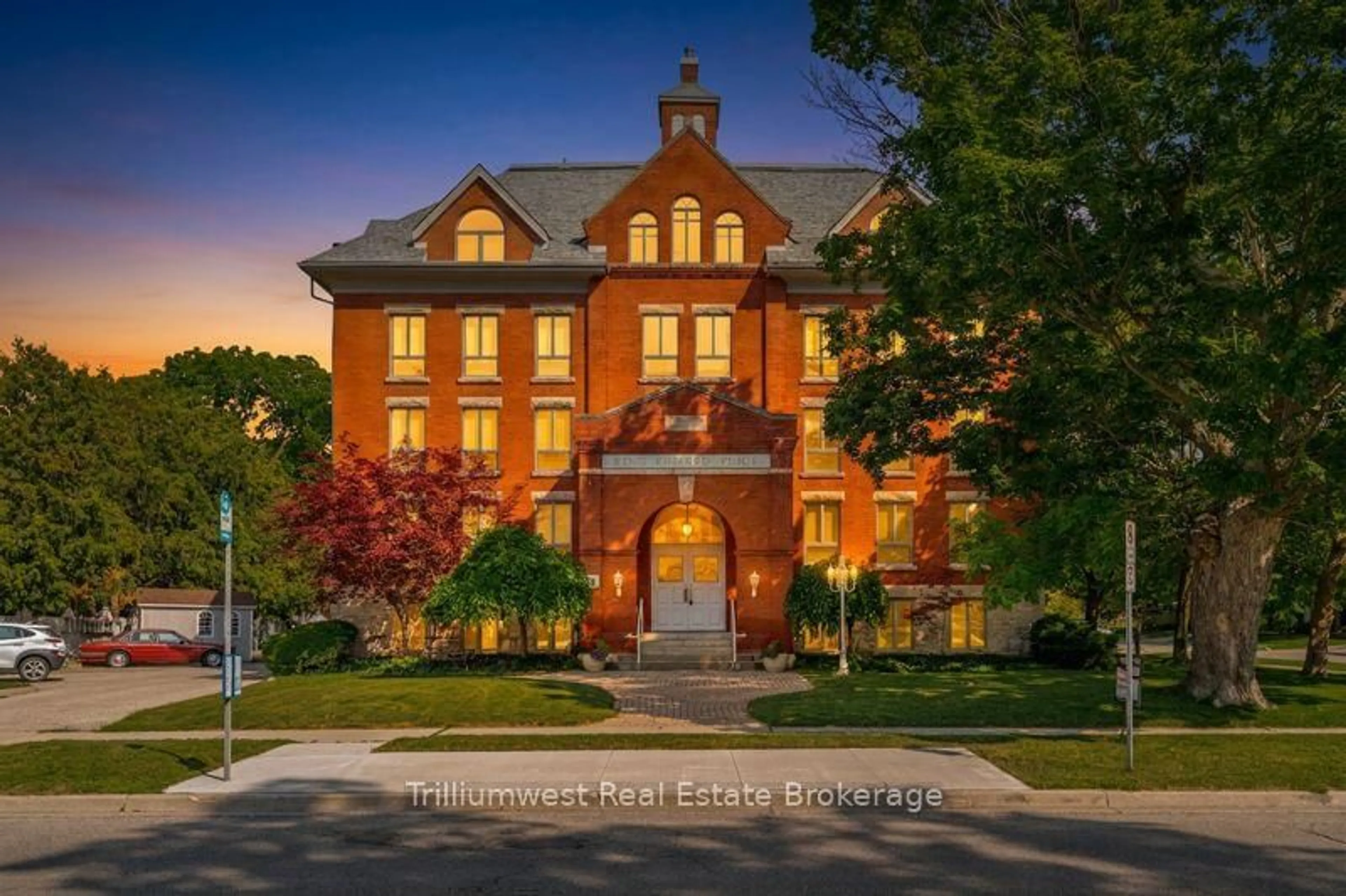 Home with brick exterior material, street for 57 Suffolk St #102, Guelph Ontario N1H 2J1