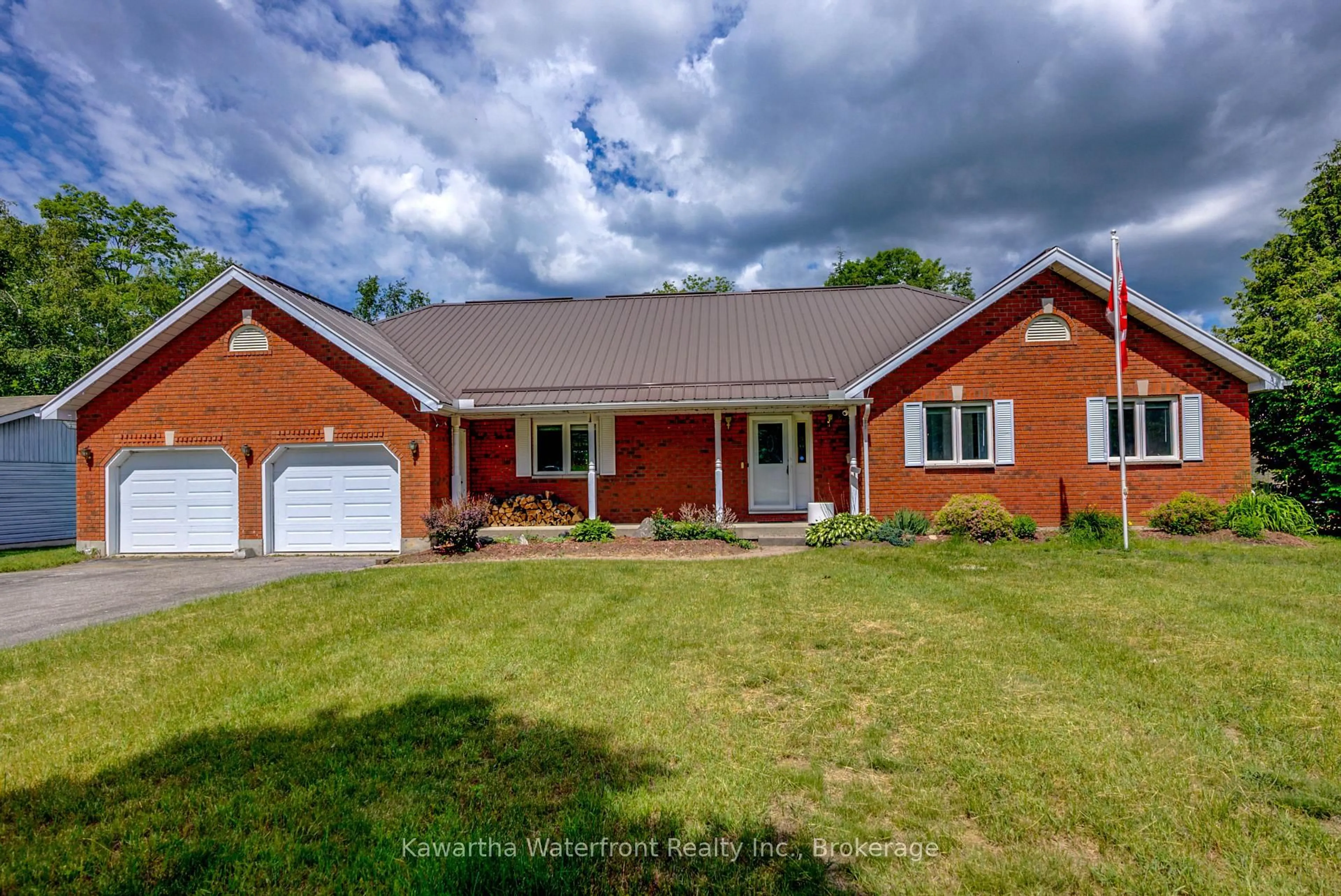 Home with brick exterior material, street for 4 Evans Dr, Kawartha Lakes Ontario K0M 1N0
