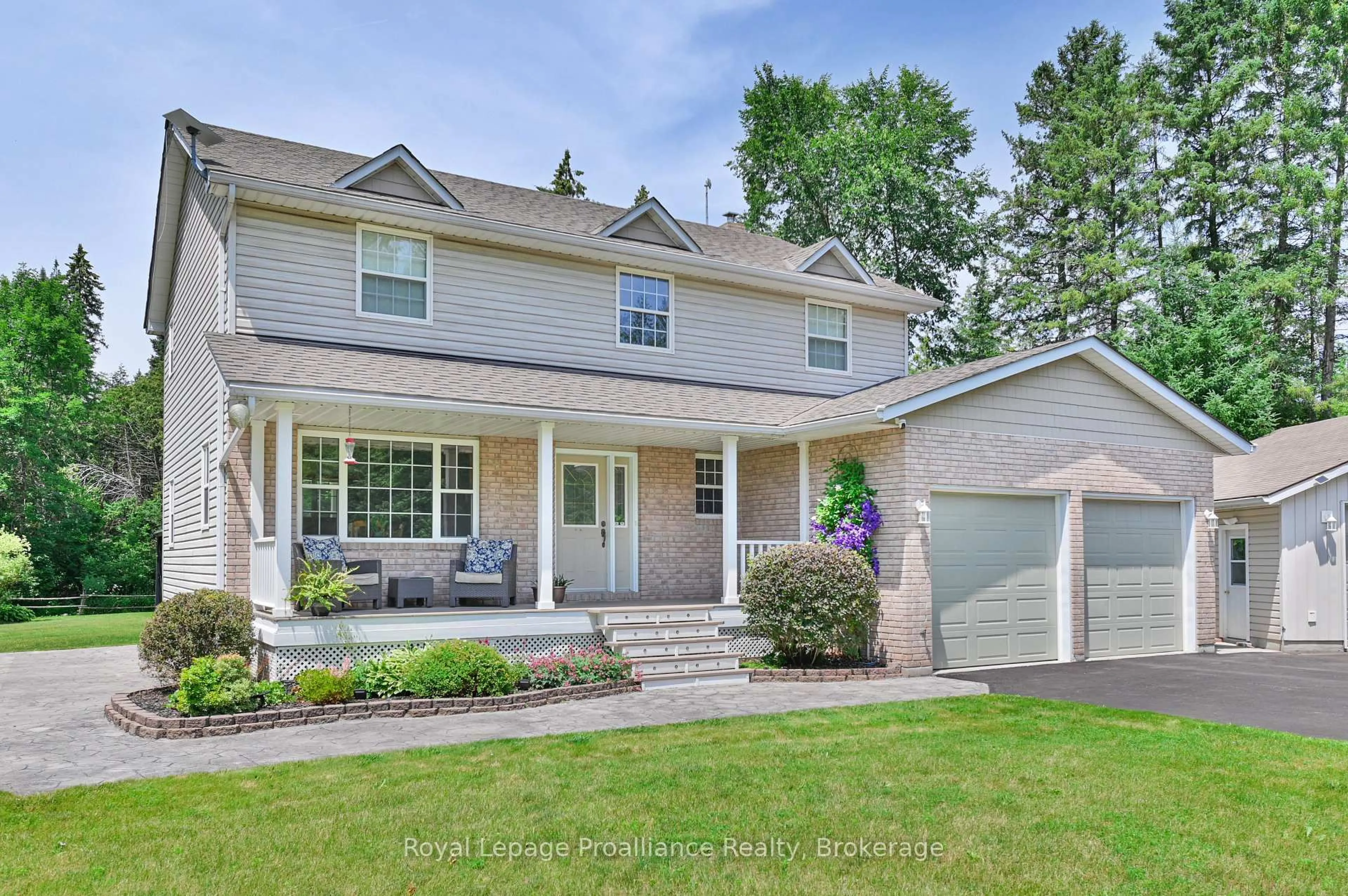 Home with vinyl exterior material, street for 1200 Wellmans Rd, Stirling Ontario K0K 3E0