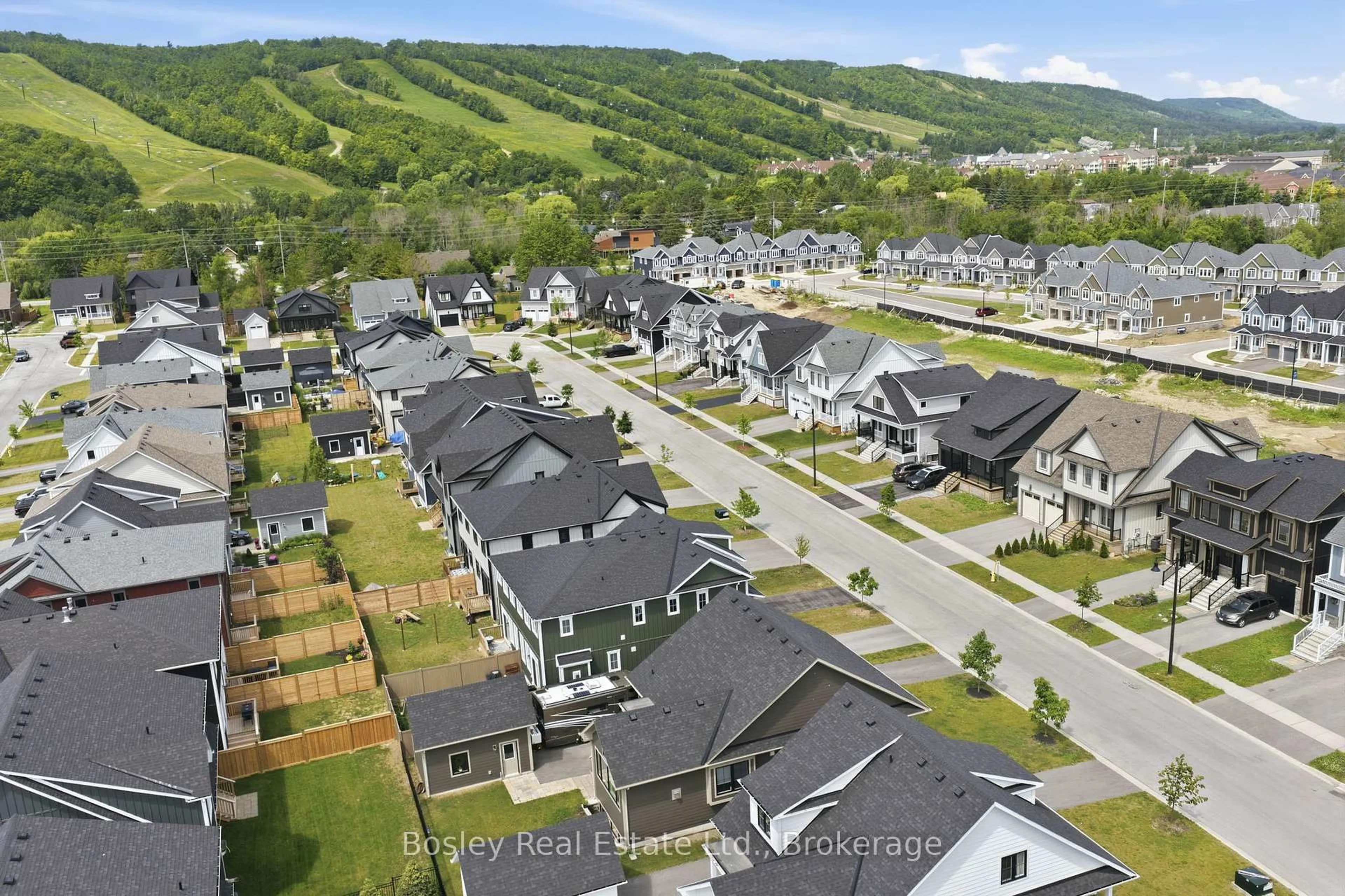 A pic from outside/outdoor area/front of a property/back of a property/a pic from drone, mountain view for 115 Black Willow Cres, Blue Mountains Ontario L9Y 0R4