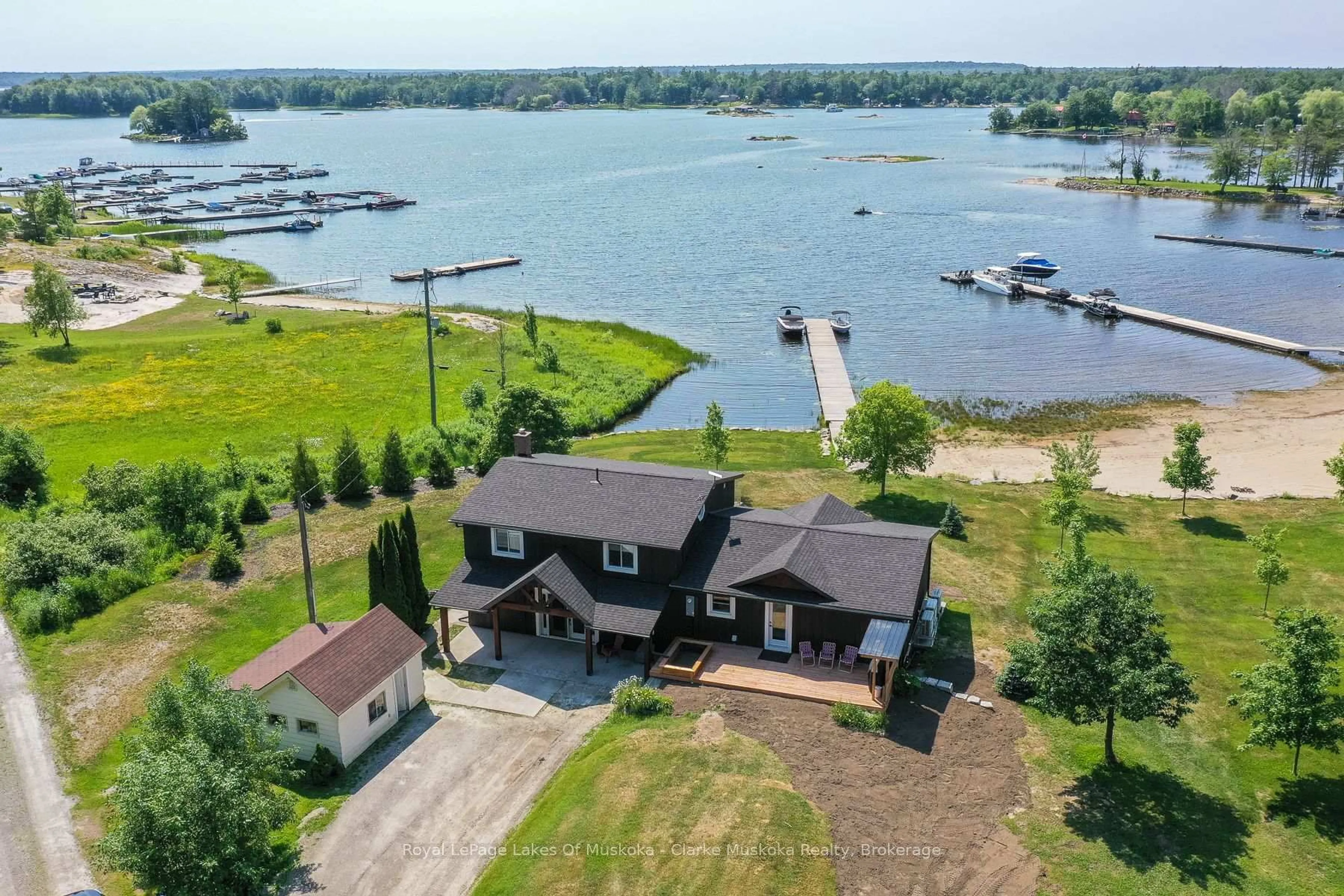 A pic from outside/outdoor area/front of a property/back of a property/a pic from drone, water/lake/river/ocean view for 21 Ellery Rd, Georgian Bay Ontario L0K 1S0
