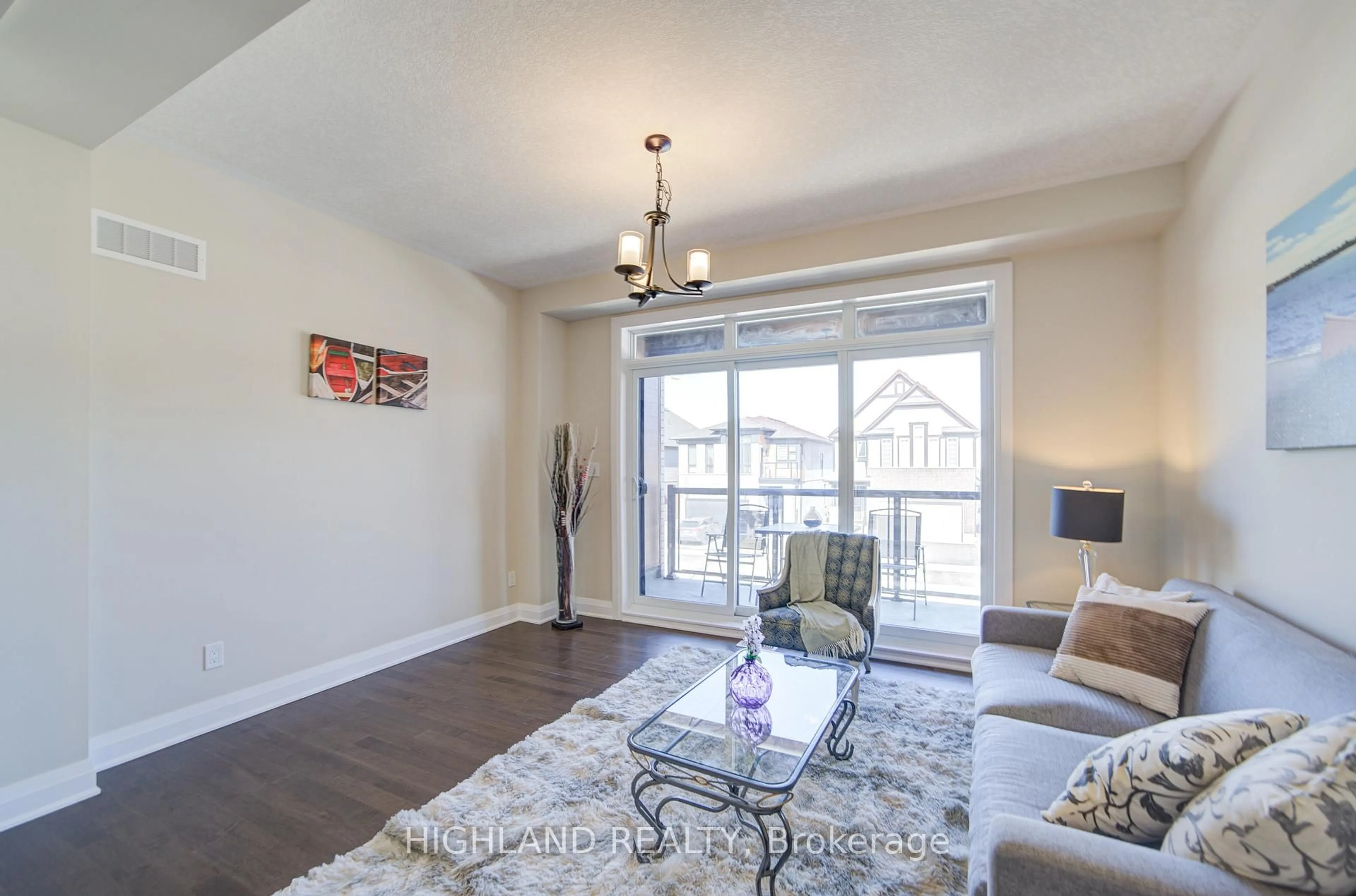 Living room with furniture, wood/laminate floor for 565 Balsam Poplar St, Waterloo Ontario N2V 0H8