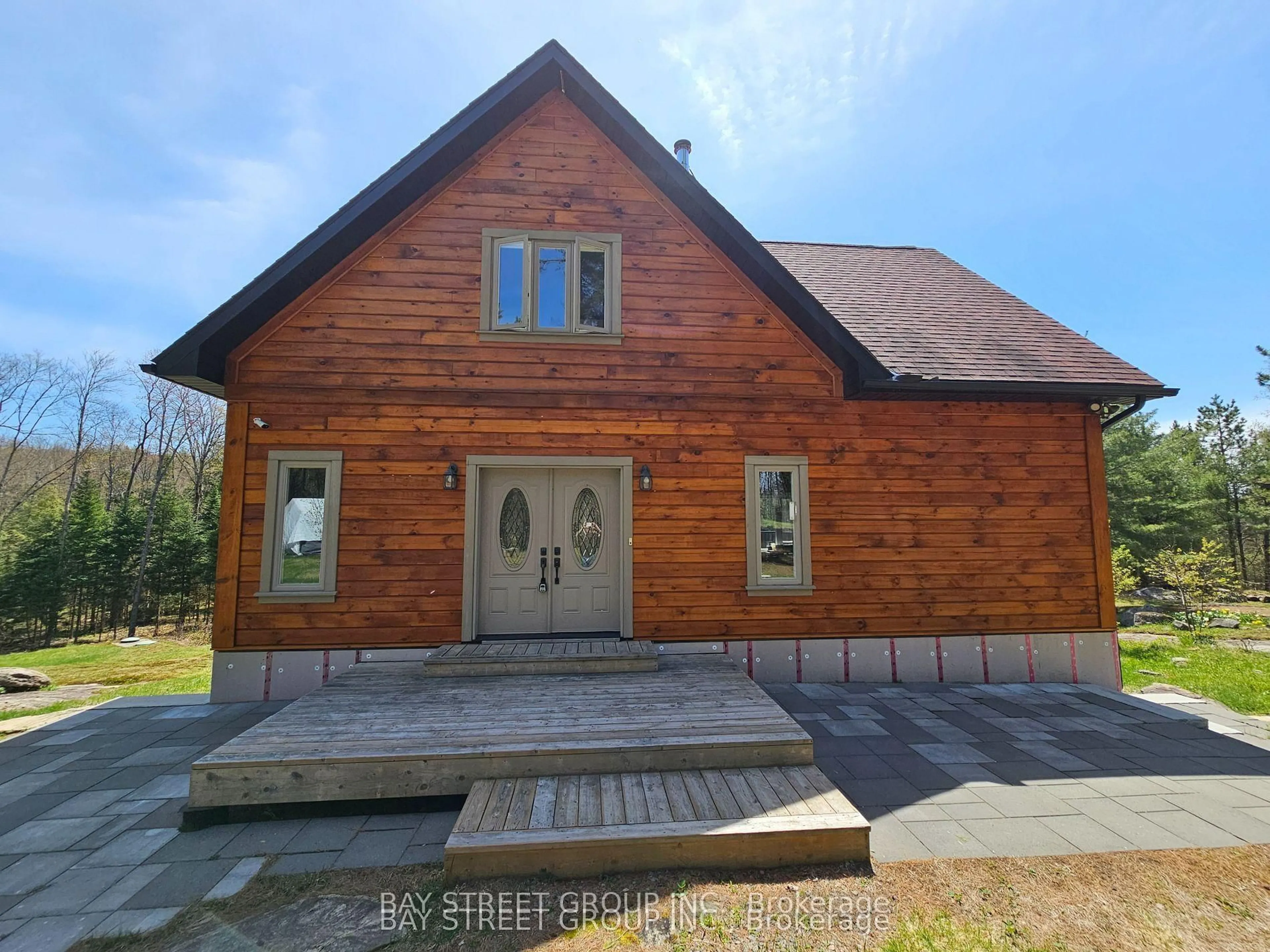 Home with brick exterior material, street for 1032 Spring Lake Rd, Bracebridge Ontario P1L 1X1