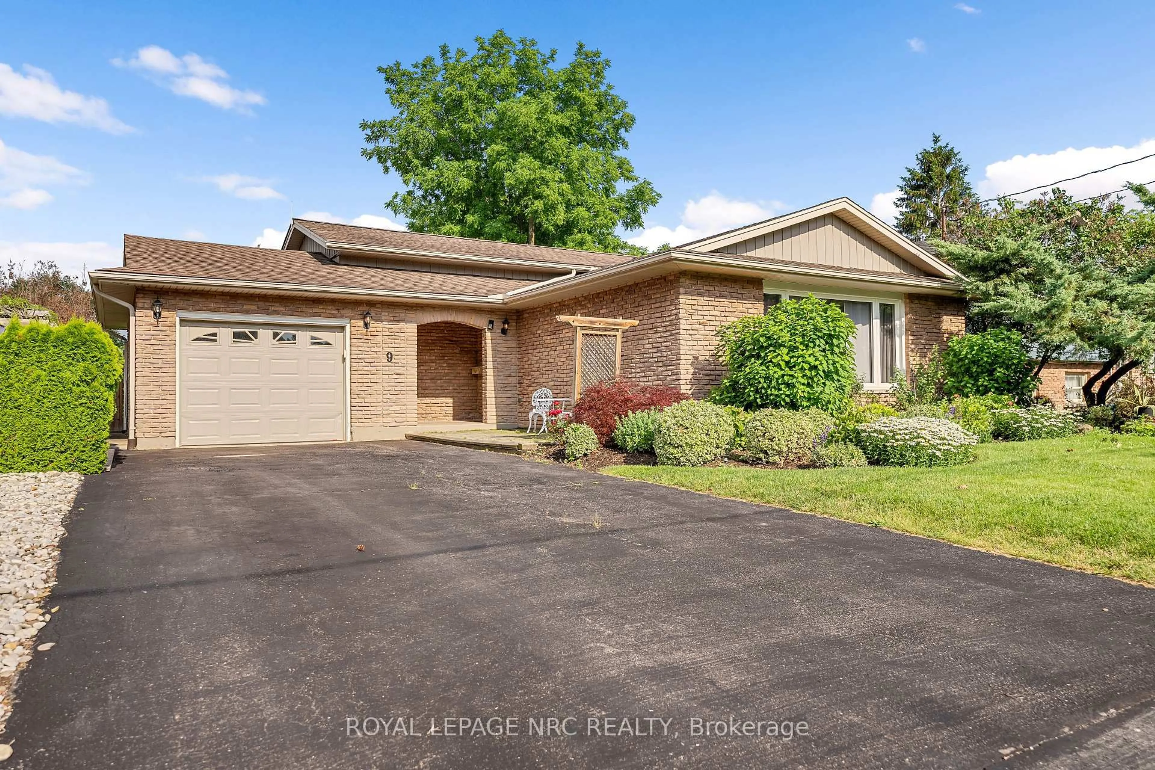 Home with brick exterior material, street for 9 Sandy Cove Dr, St. Catharines Ontario L2N 5Z3