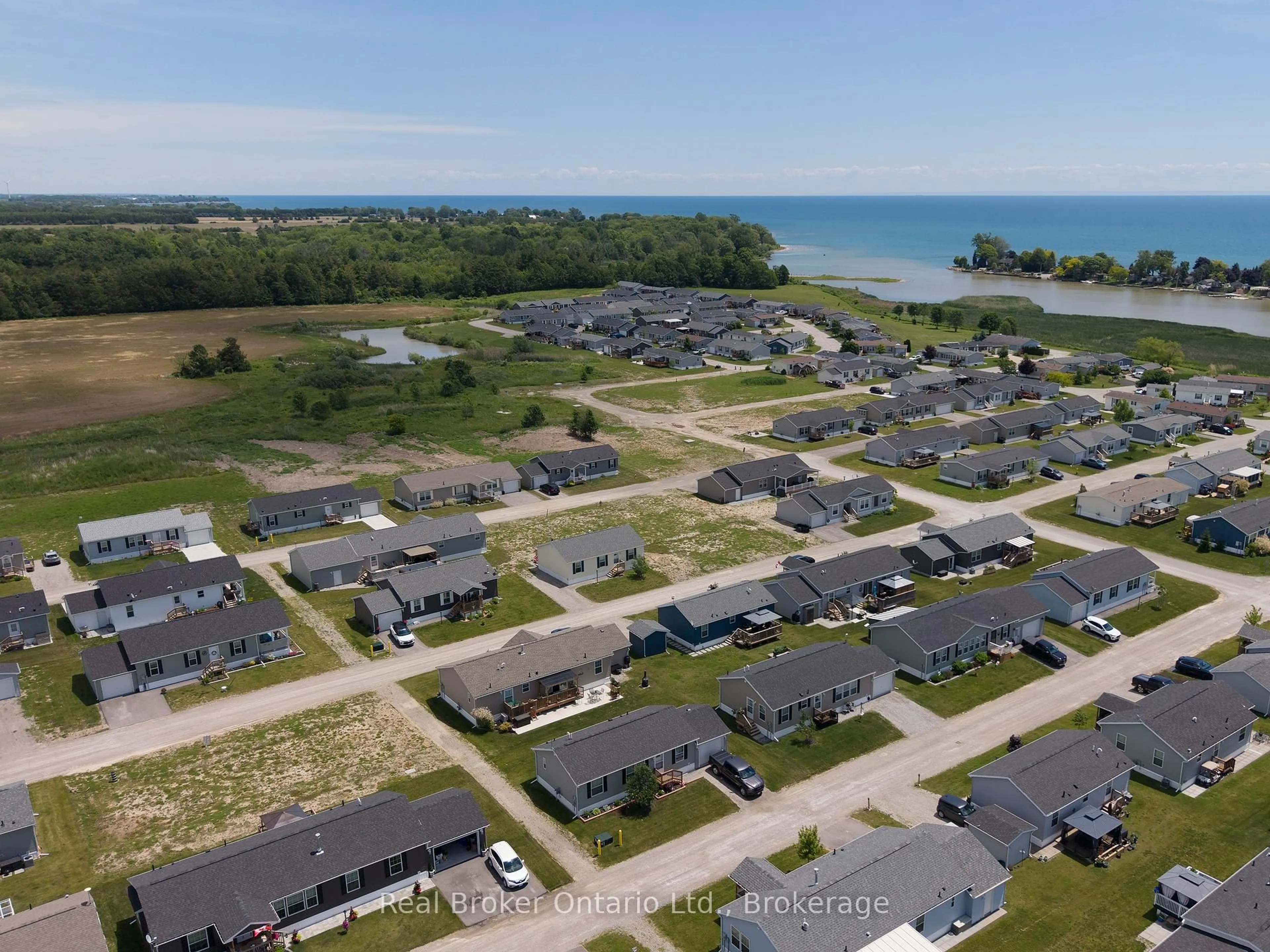 A pic from outside/outdoor area/front of a property/back of a property/a pic from drone, water/lake/river/ocean view for 10 BENT WILLOW Crt, Haldimand Ontario N0A 1L0