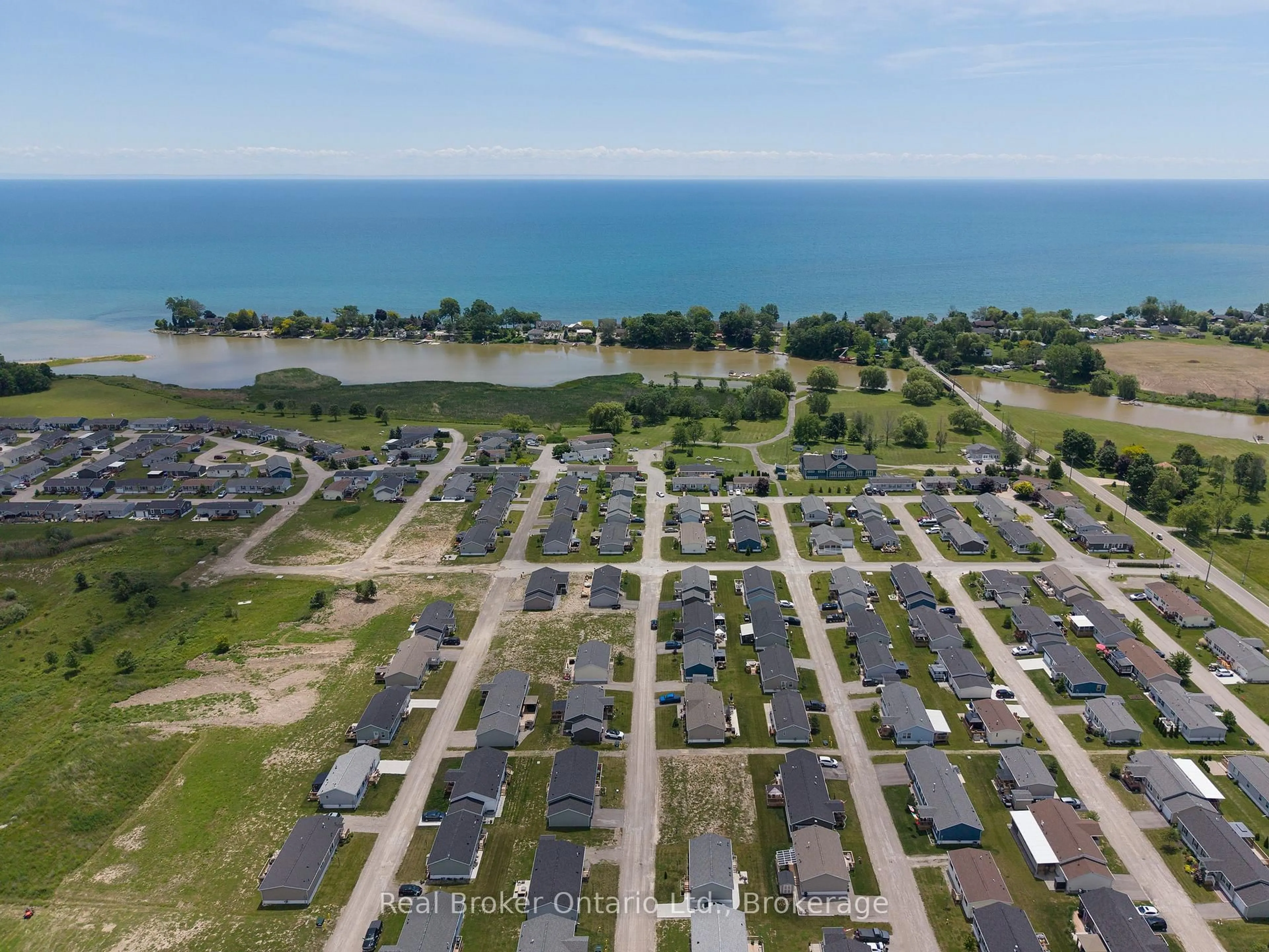 A pic from outside/outdoor area/front of a property/back of a property/a pic from drone, water/lake/river/ocean view for 10 BENT WILLOW Crt, Haldimand Ontario N0A 1L0