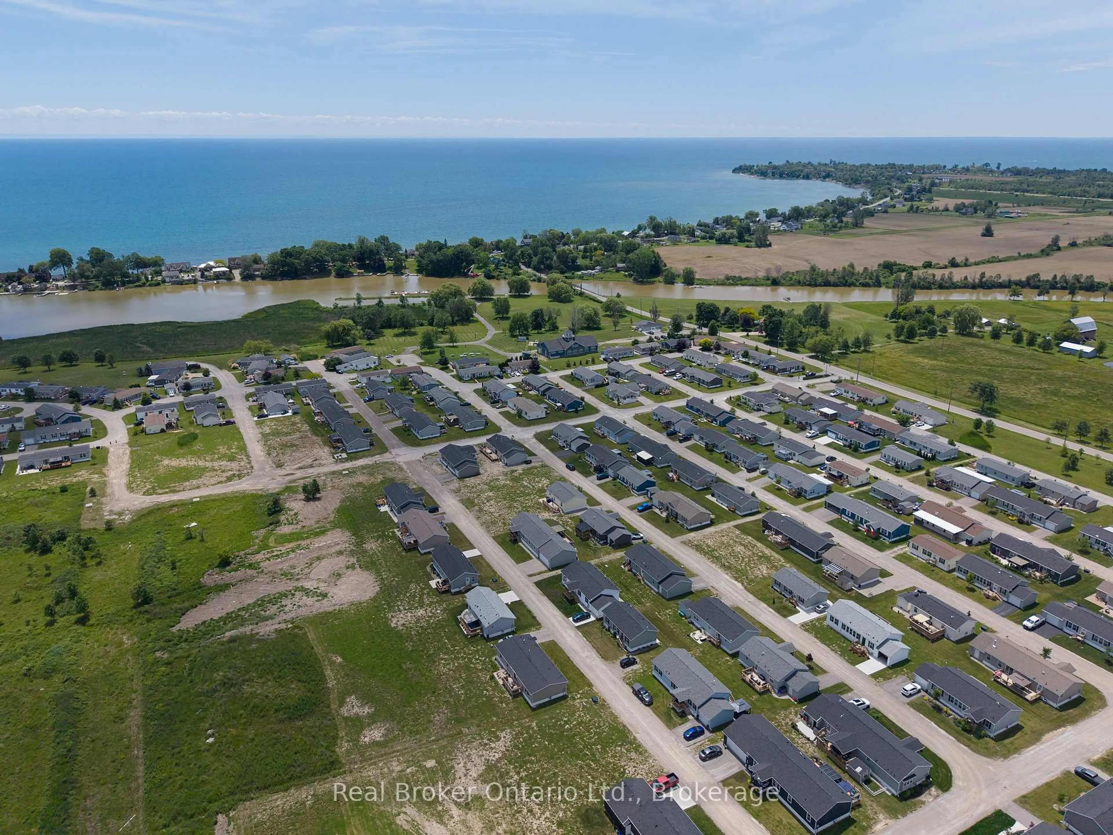 A pic from outside/outdoor area/front of a property/back of a property/a pic from drone, water/lake/river/ocean view for 10 BENT WILLOW Crt, Haldimand Ontario N0A 1L0