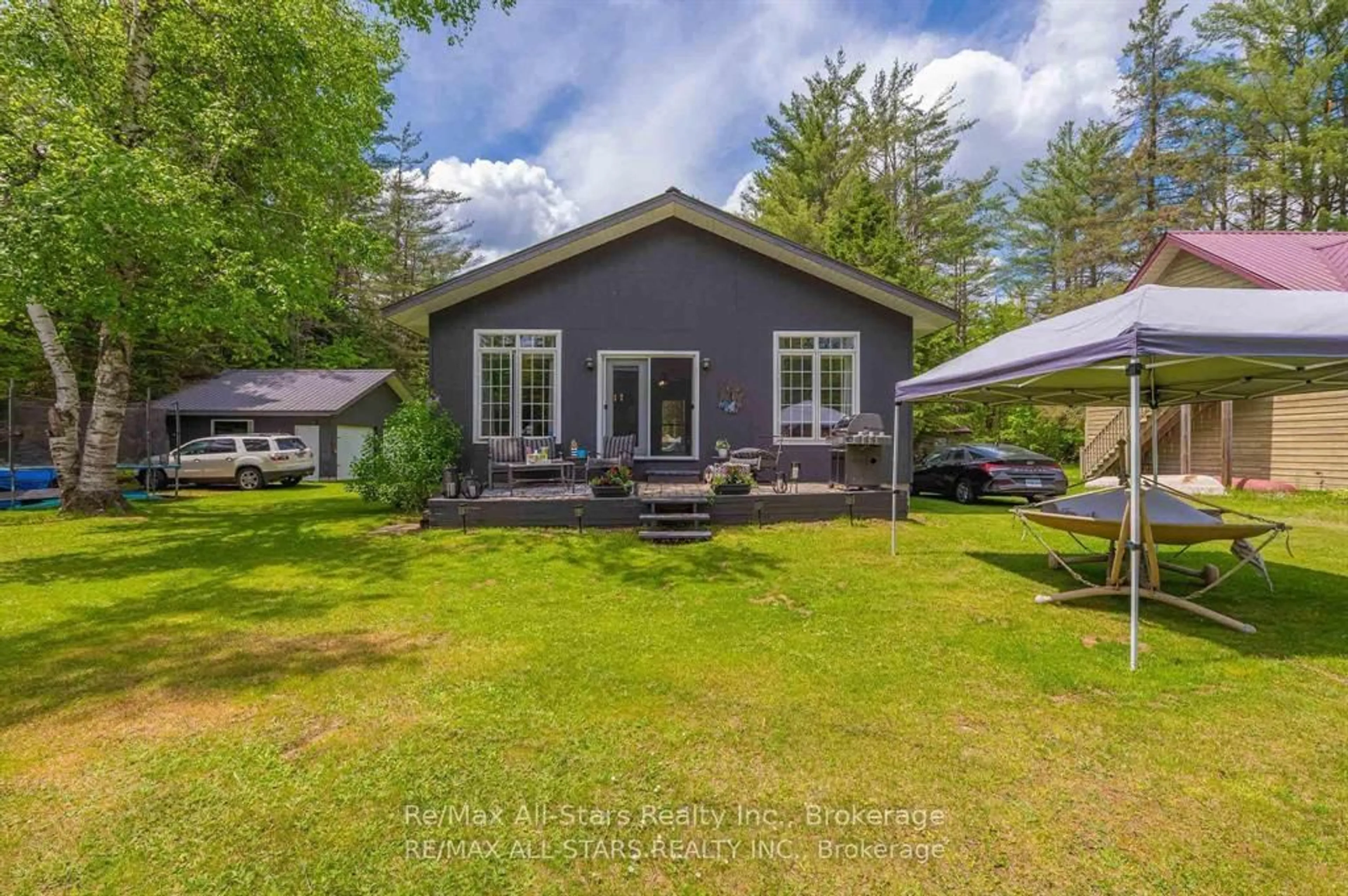 A pic from outside/outdoor area/front of a property/back of a property/a pic from drone, unknown for 24 Relax Ave, Kawartha Lakes Ontario K0M 2L0