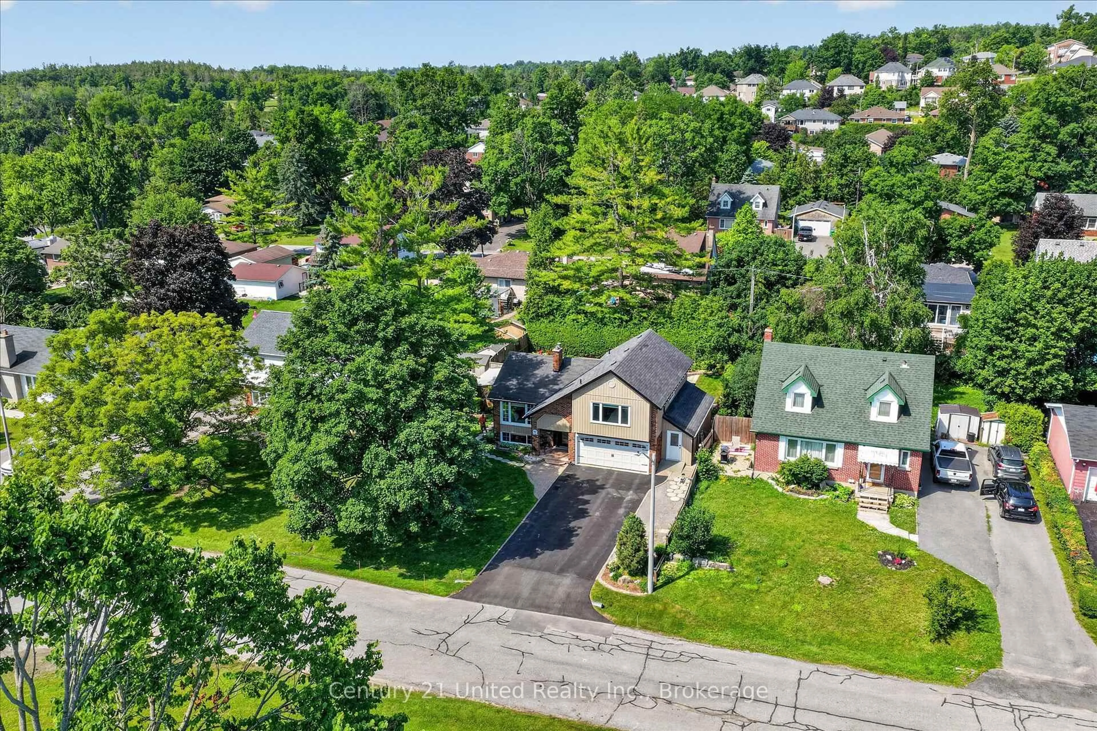 A pic from outside/outdoor area/front of a property/back of a property/a pic from drone, street for 83 Nevin Ave, Peterborough Ontario K9J 6E9