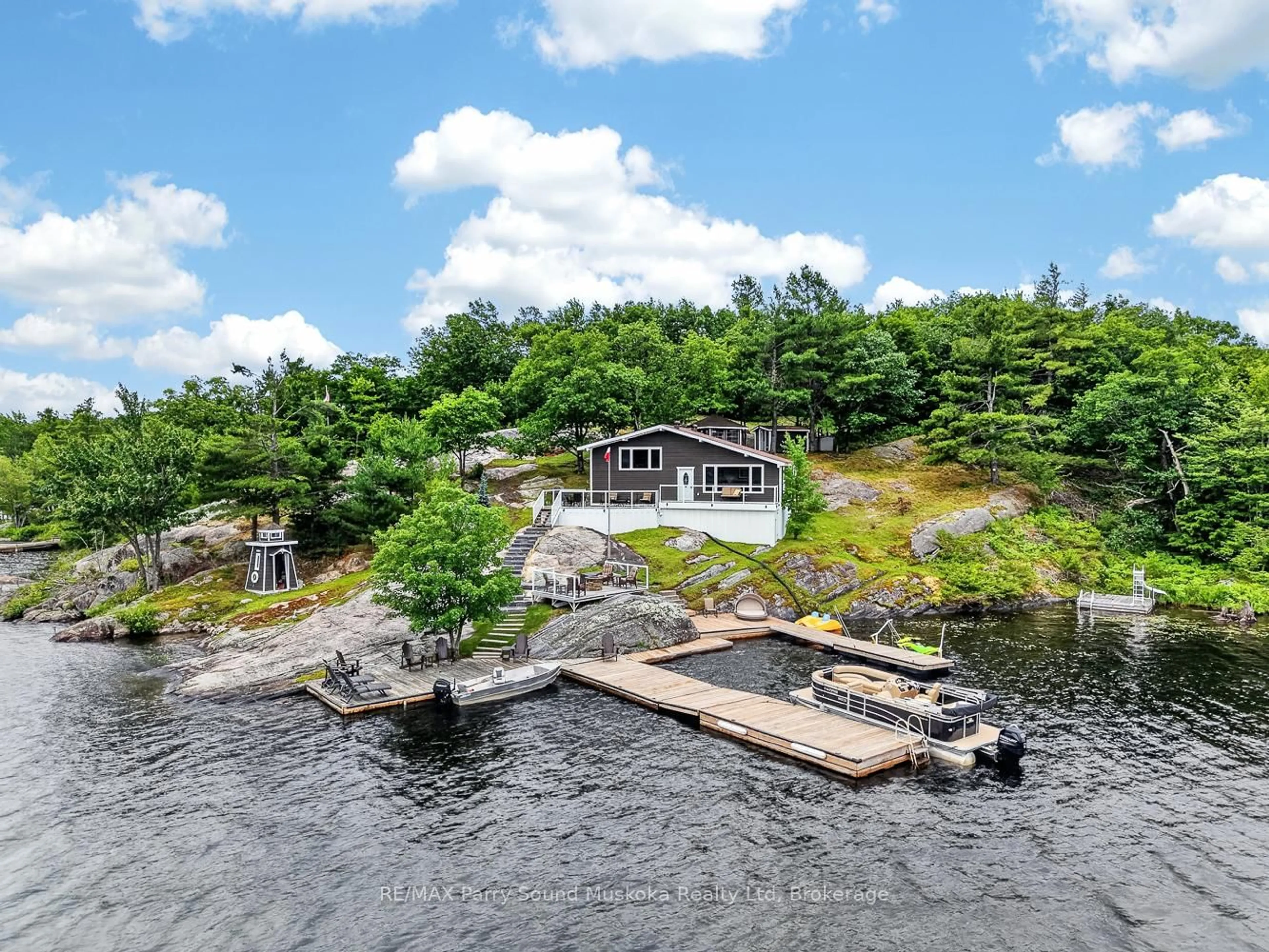 A pic from outside/outdoor area/front of a property/back of a property/a pic from drone, water/lake/river/ocean view for 101 Healey Lake Water, The Archipelago Ontario P0C 1H0