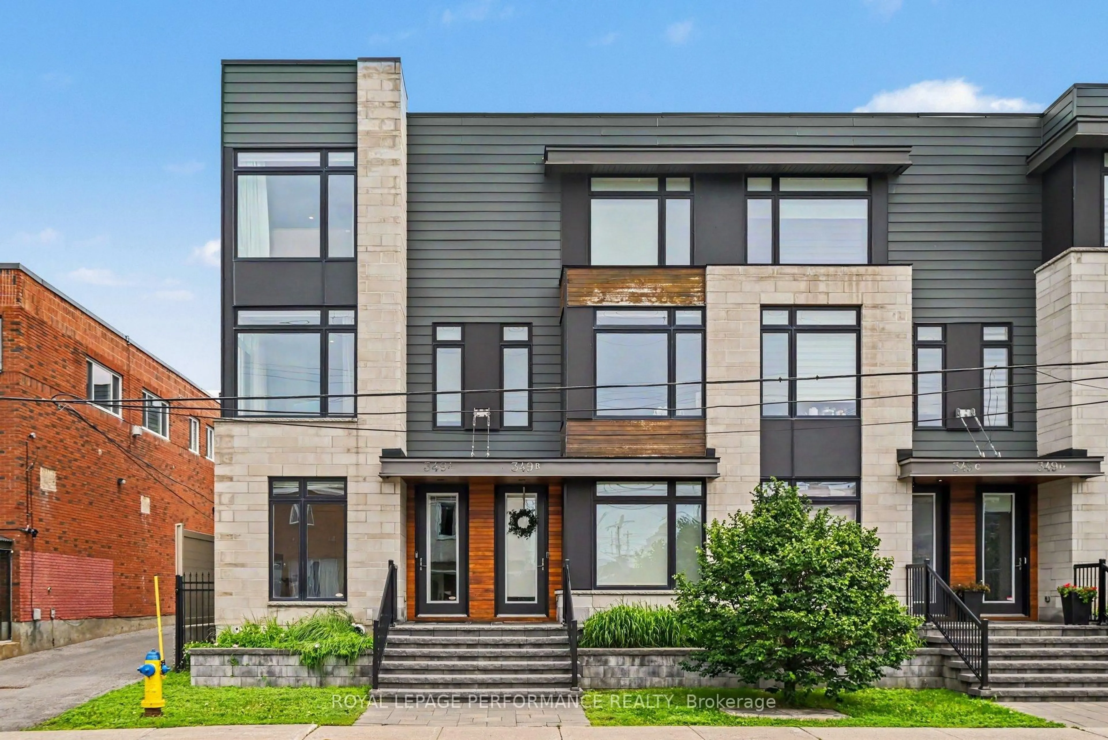Home with brick exterior material, street for 349 Booth St #A, Ottawa Ontario K1R 7K1