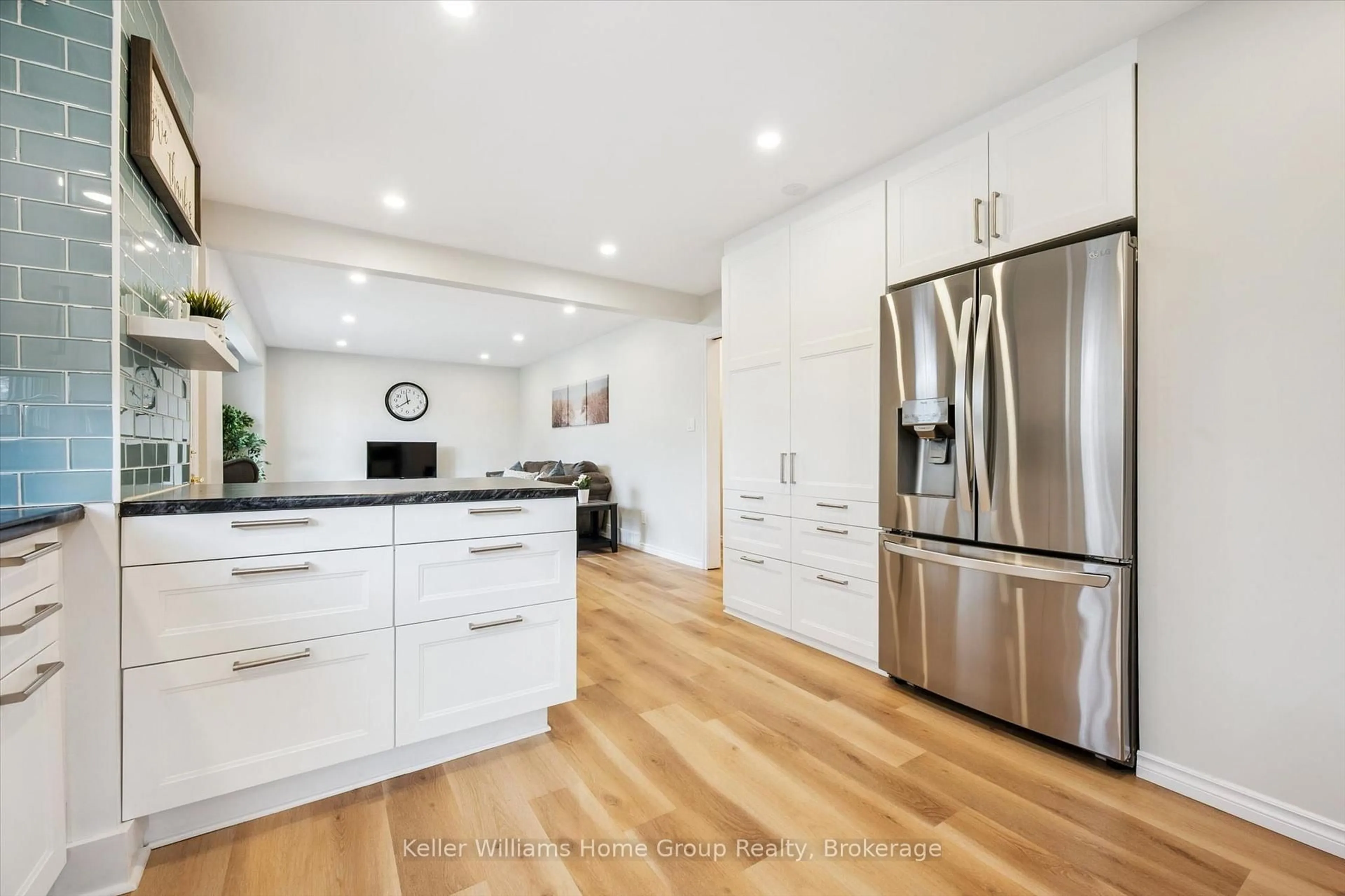Open concept kitchen, wood/laminate floor for 23 Hastings Blvd, Guelph Ontario N1E 4G3
