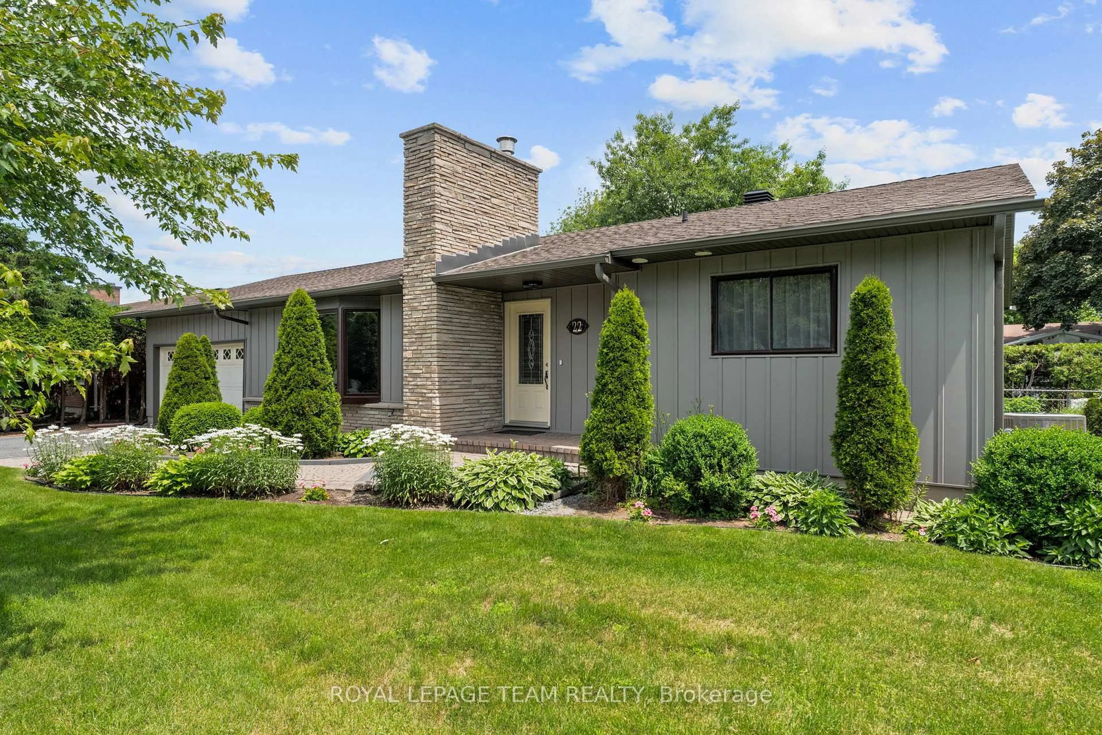 Home with brick exterior material, street for 22 Barrhaven Cres, Ottawa Ontario K2J 1E8
