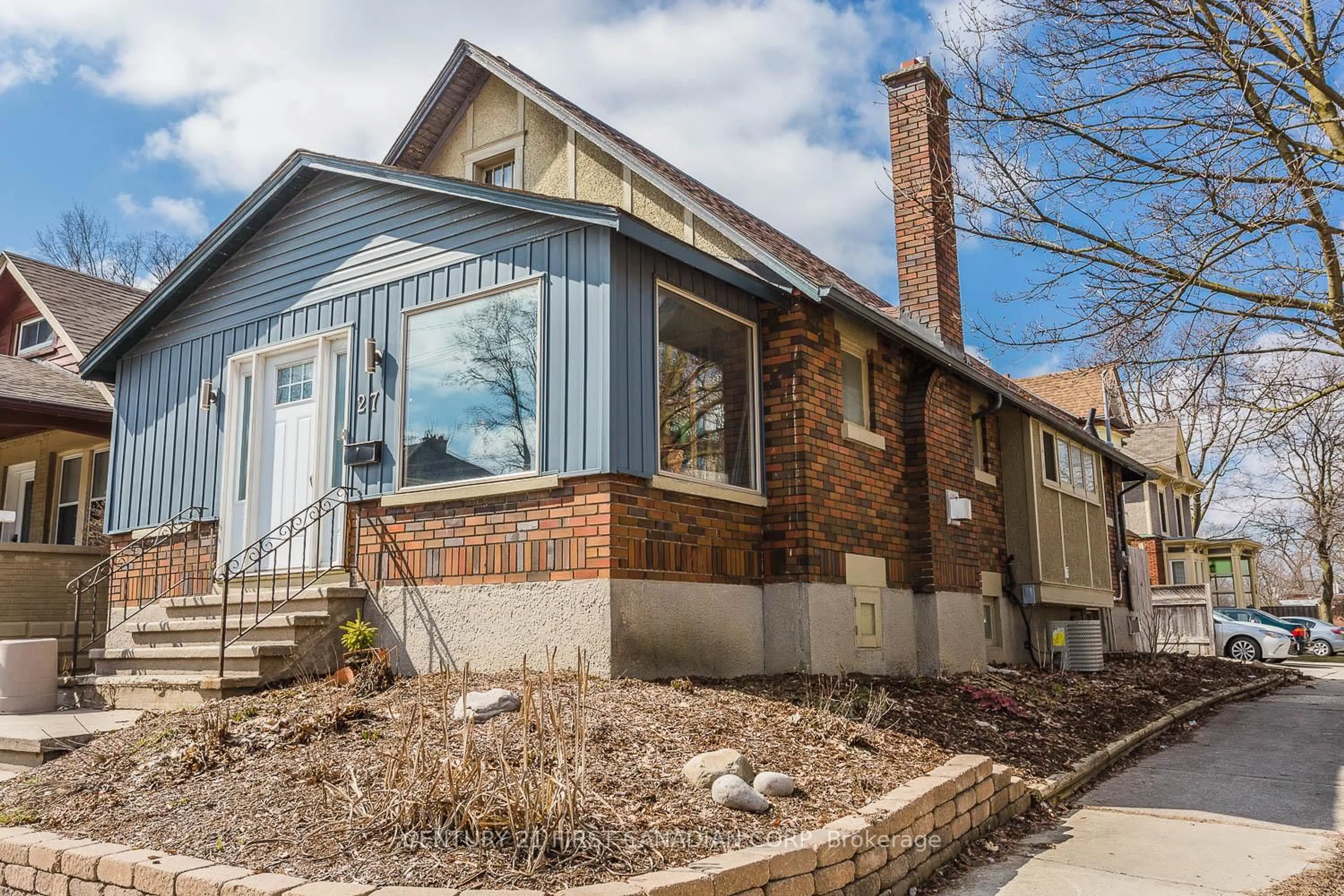 Home with brick exterior material, street for 27 Wharncliffe Rd, London South Ontario N6J 2J5