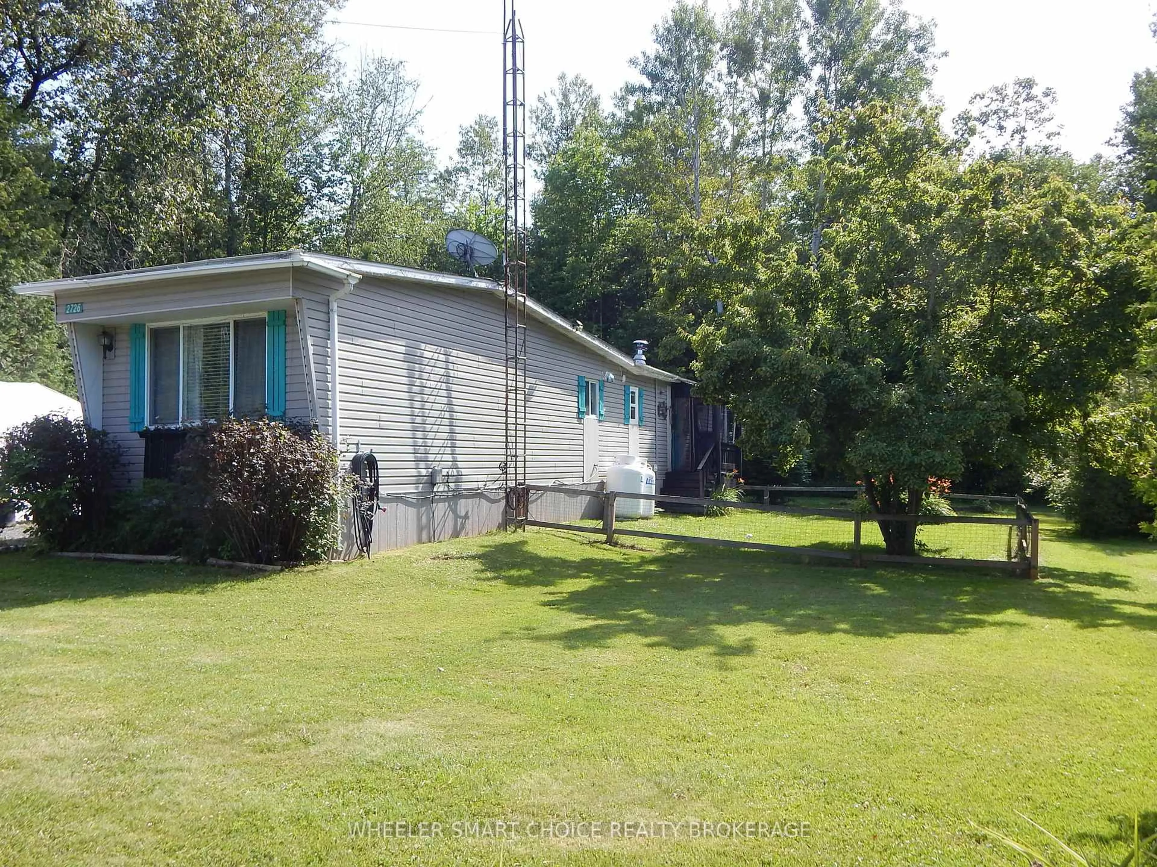 A pic from outside/outdoor area/front of a property/back of a property/a pic from drone, forest/trees view for 2726 Grysewood Lane, North Stormont Ontario K0C 1T0