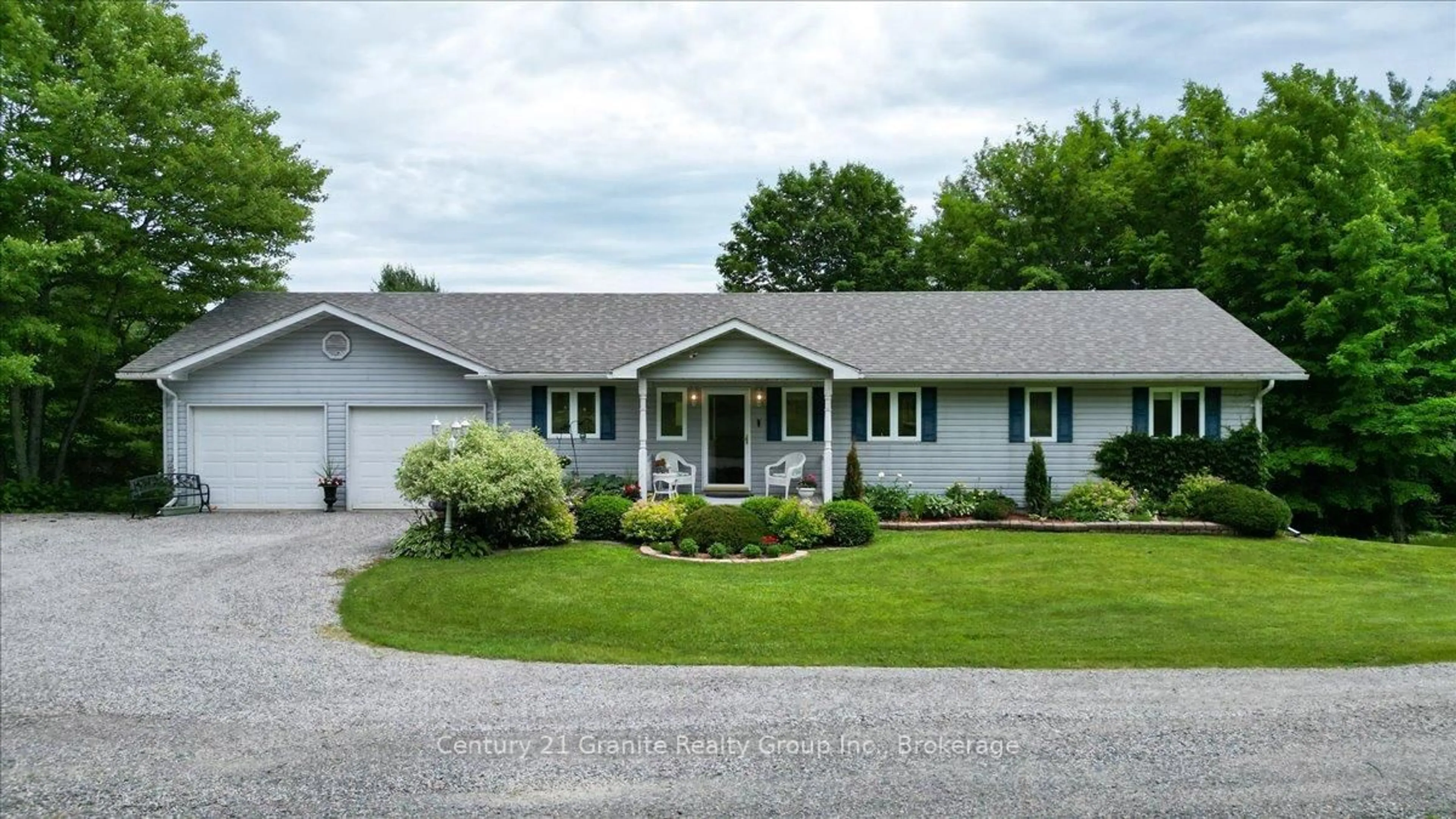 Home with vinyl exterior material, street for 1573 Ojibway Rd, Highlands East Ontario K0L 2A0