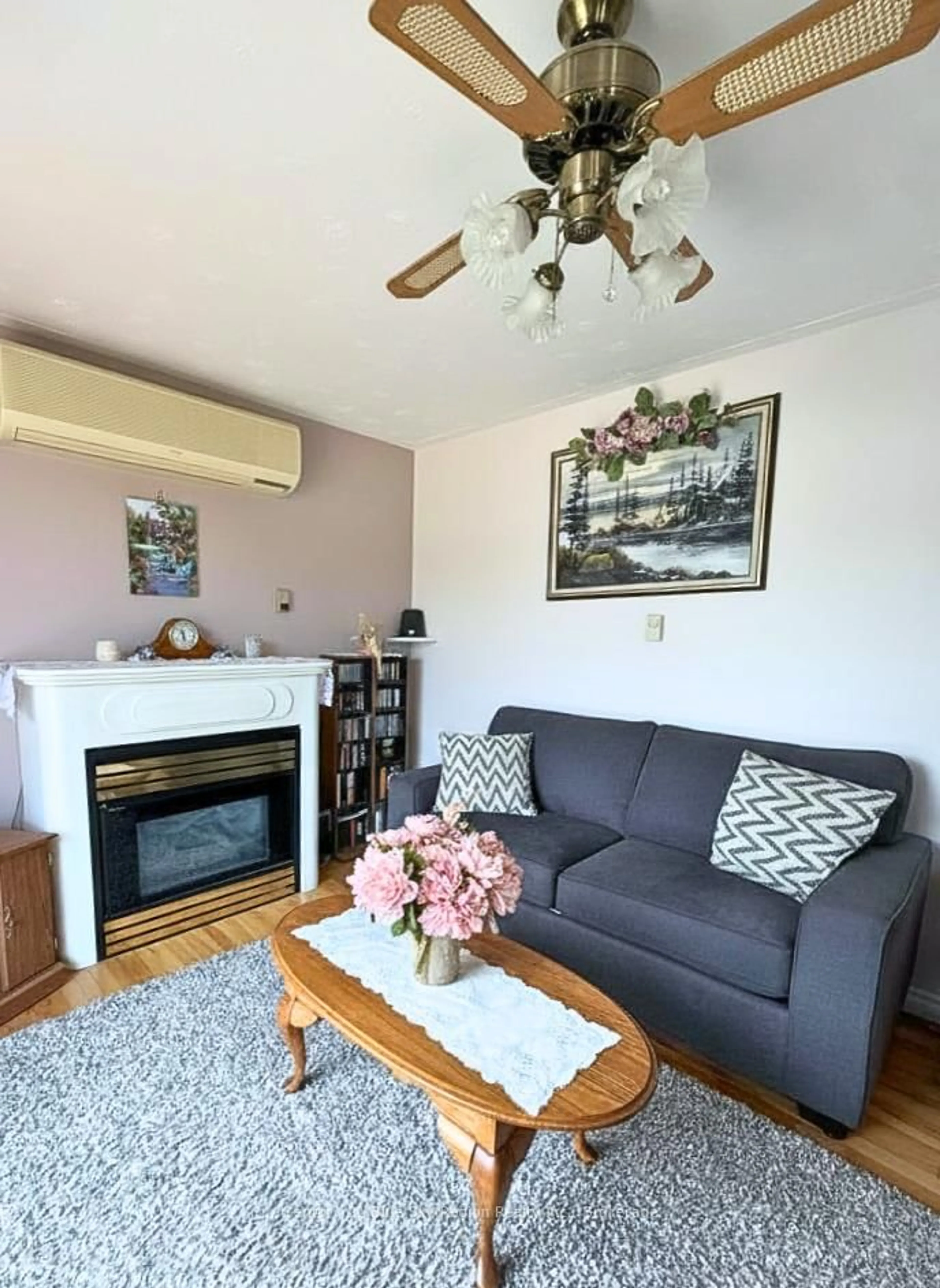 Living room with furniture, wood/laminate floor for 350 Louis St, Mattawa Ontario P0H 1V0