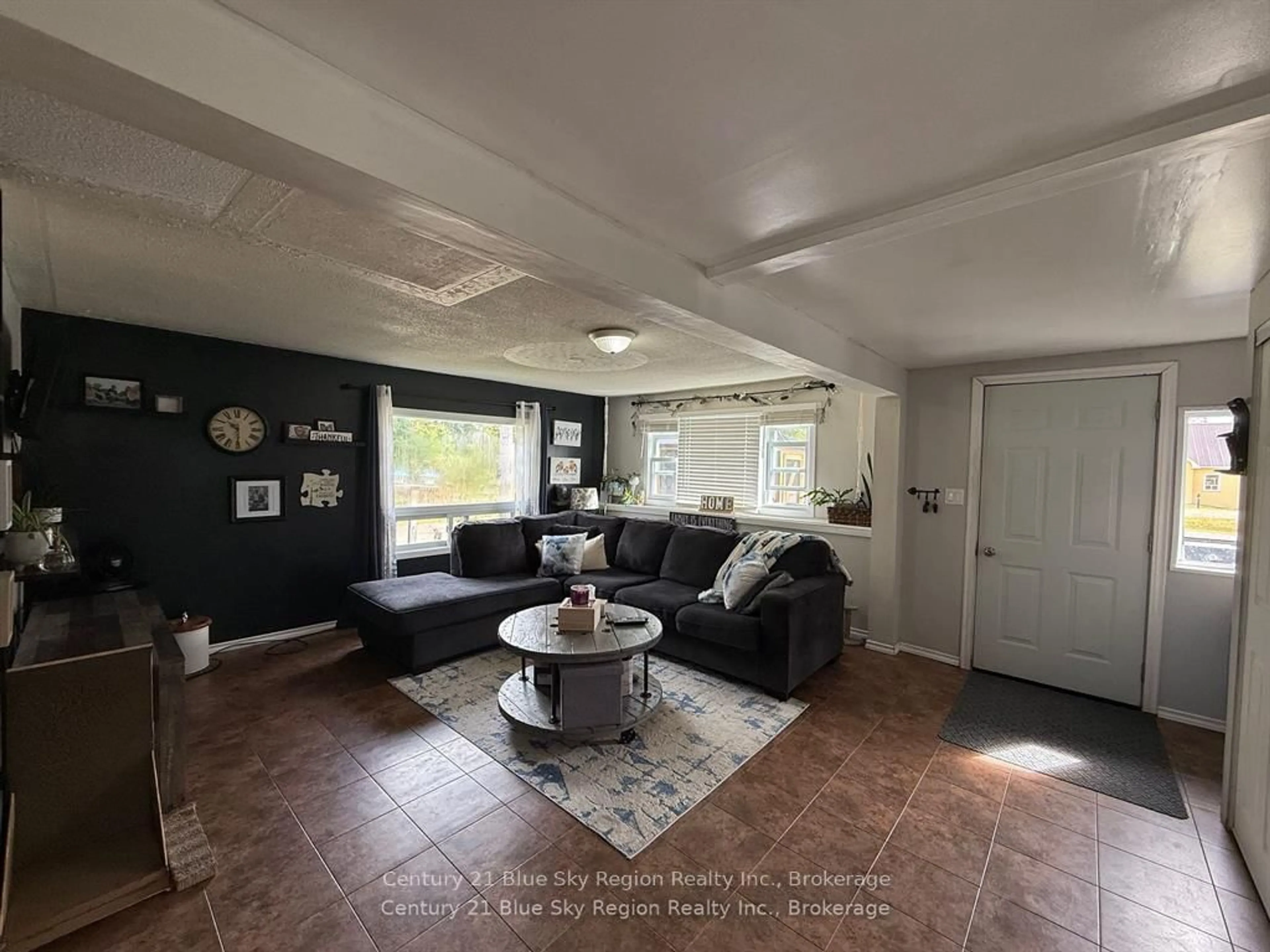 Living room with furniture, ceramic/tile floor for 15 Church Rd ##B, Unorganized Townships Ontario P0H 2A0