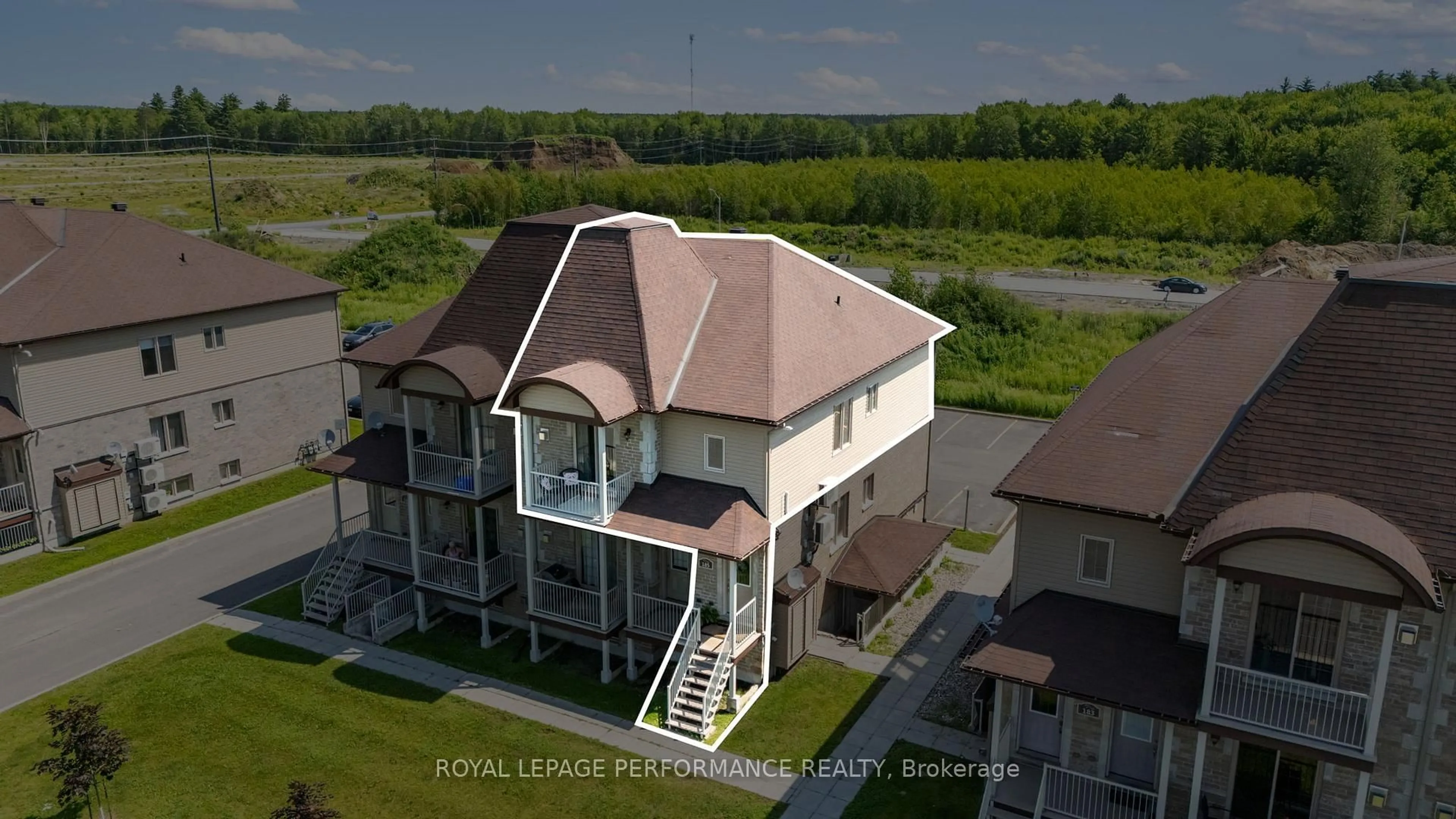 A pic from outside/outdoor area/front of a property/back of a property/a pic from drone, building for 185 Bourdeau Blvd #3, The Nation Ontario K0A 2M0