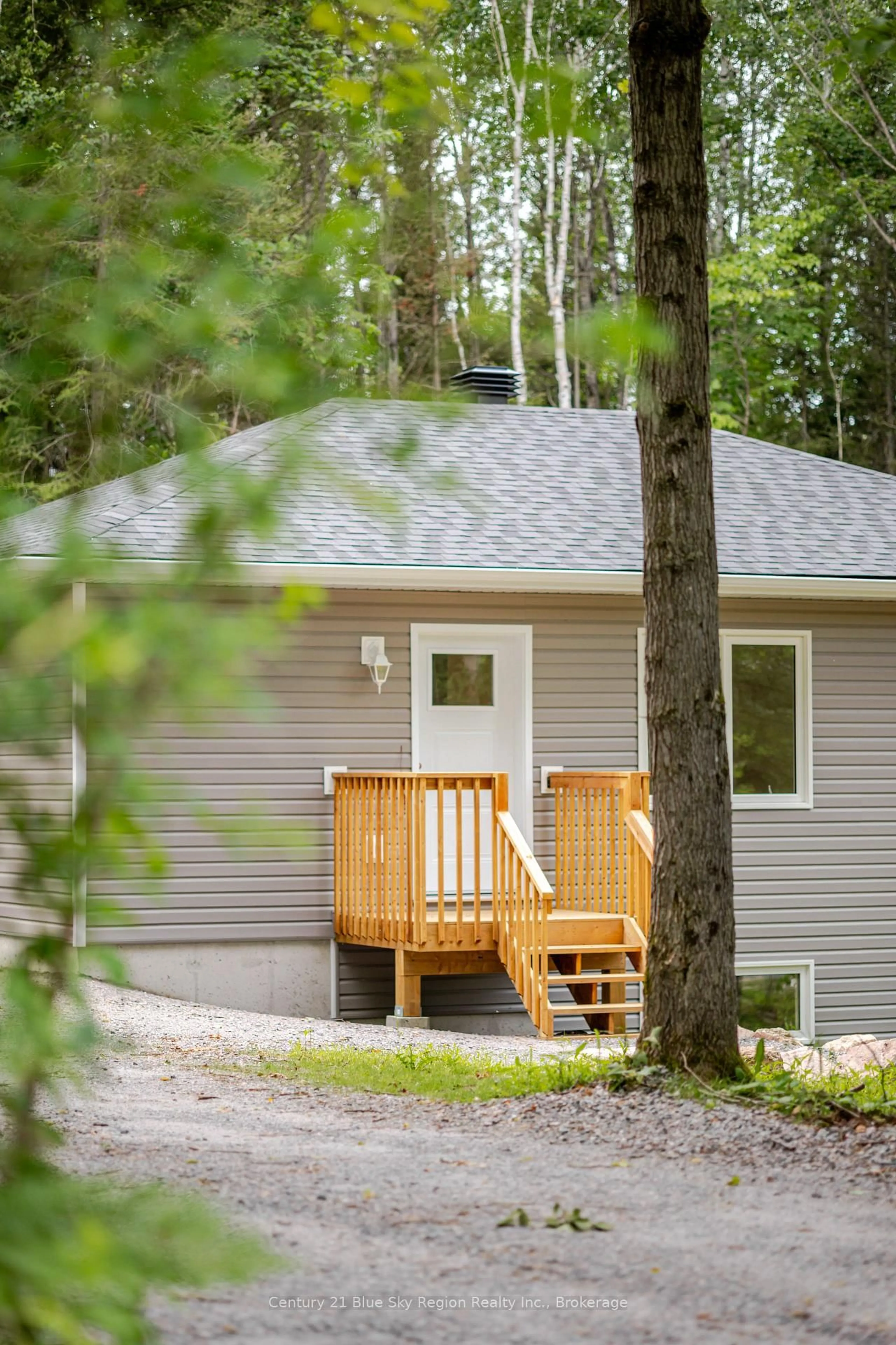 Home with vinyl exterior material, forest/trees view for 205 Greenwood Dr, Bonfield Ontario P0H 1E0