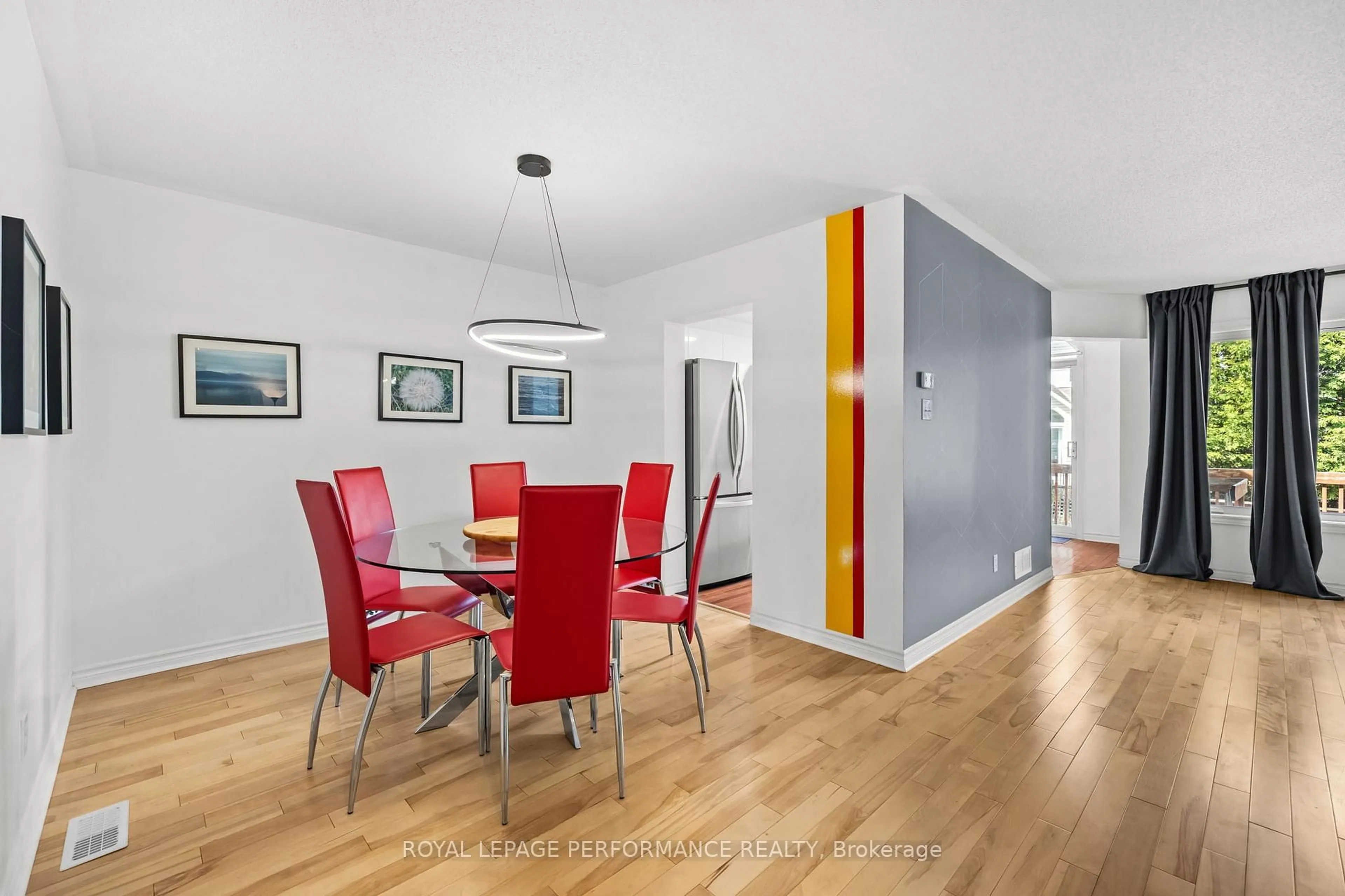 Dining room, wood/laminate floor for 6420 Sablewood Pl, Ottawa Ontario K1C 7L7