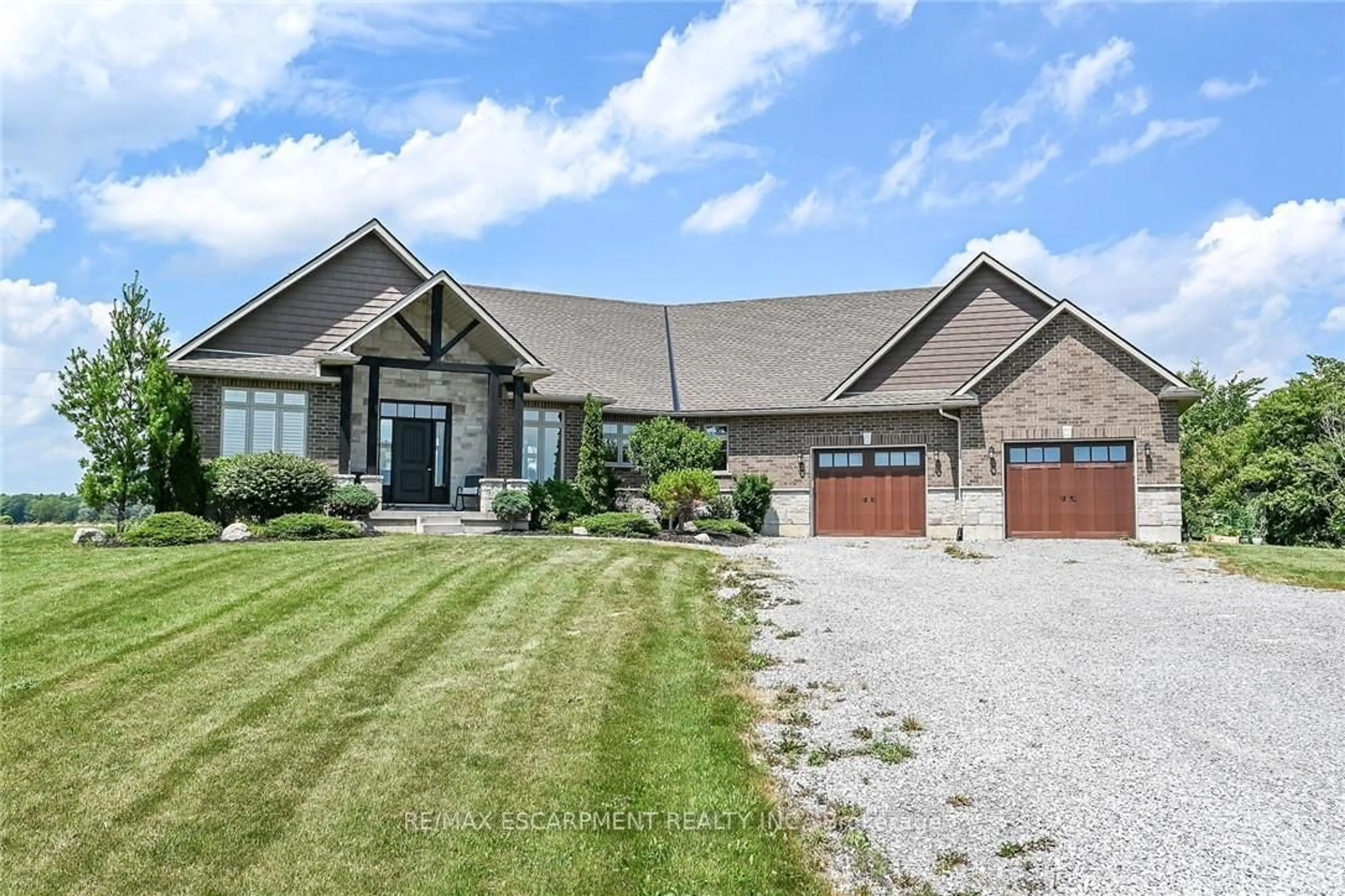 Home with brick exterior material, street for 1471 Concession 5 Woodhouse Rd, Norfolk Ontario N0A 1N1