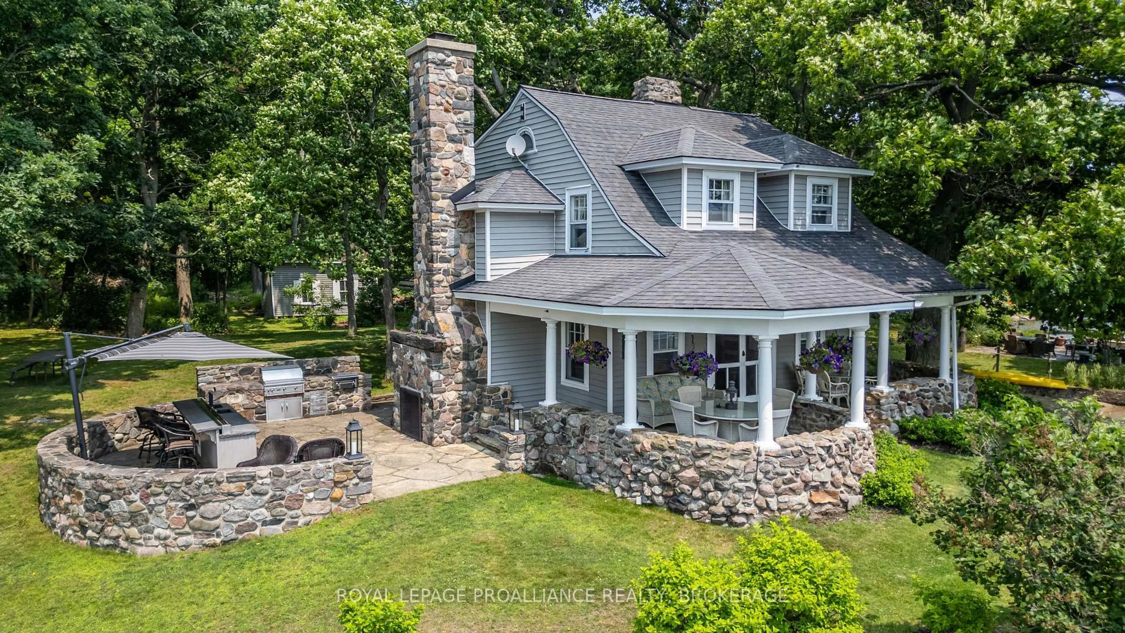 A pic from outside/outdoor area/front of a property/back of a property/a pic from drone, water/lake/river/ocean view for 121 Tremont Park Island, Leeds and the Thousand Islands Ontario K7G 3C9
