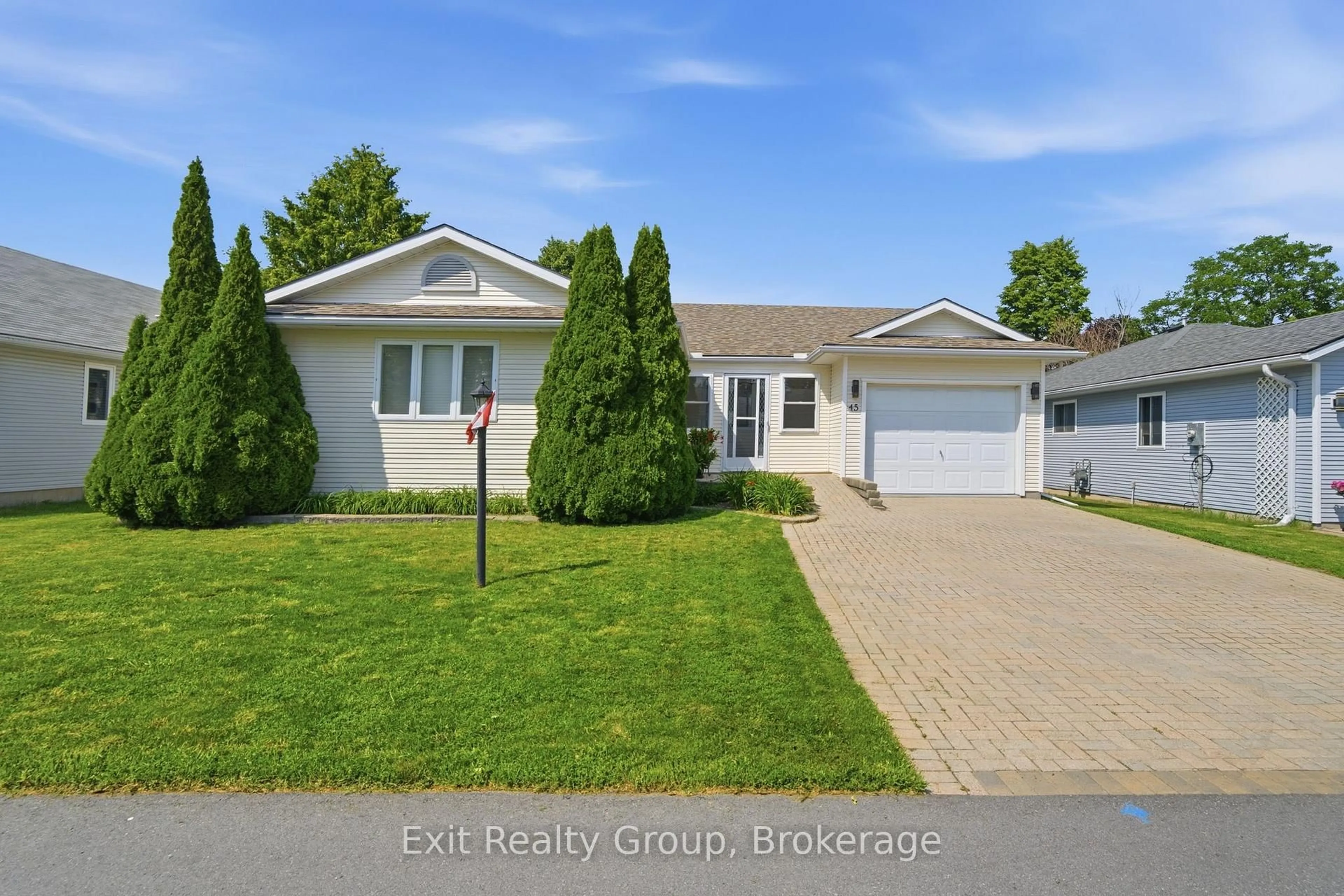 A pic from outside/outdoor area/front of a property/back of a property/a pic from drone, street for 45 Heritage Dr, Prince Edward County Ontario K0K 3L0