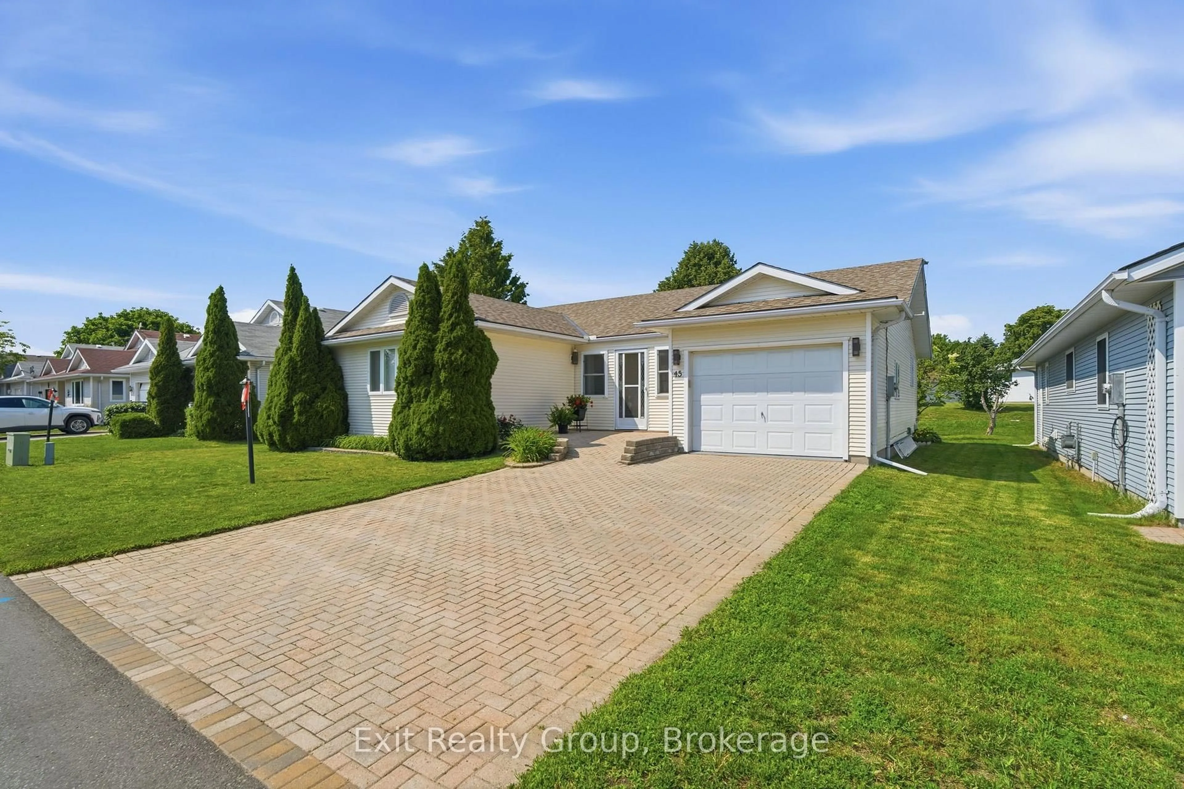 A pic from outside/outdoor area/front of a property/back of a property/a pic from drone, street for 45 Heritage Dr, Prince Edward County Ontario K0K 3L0