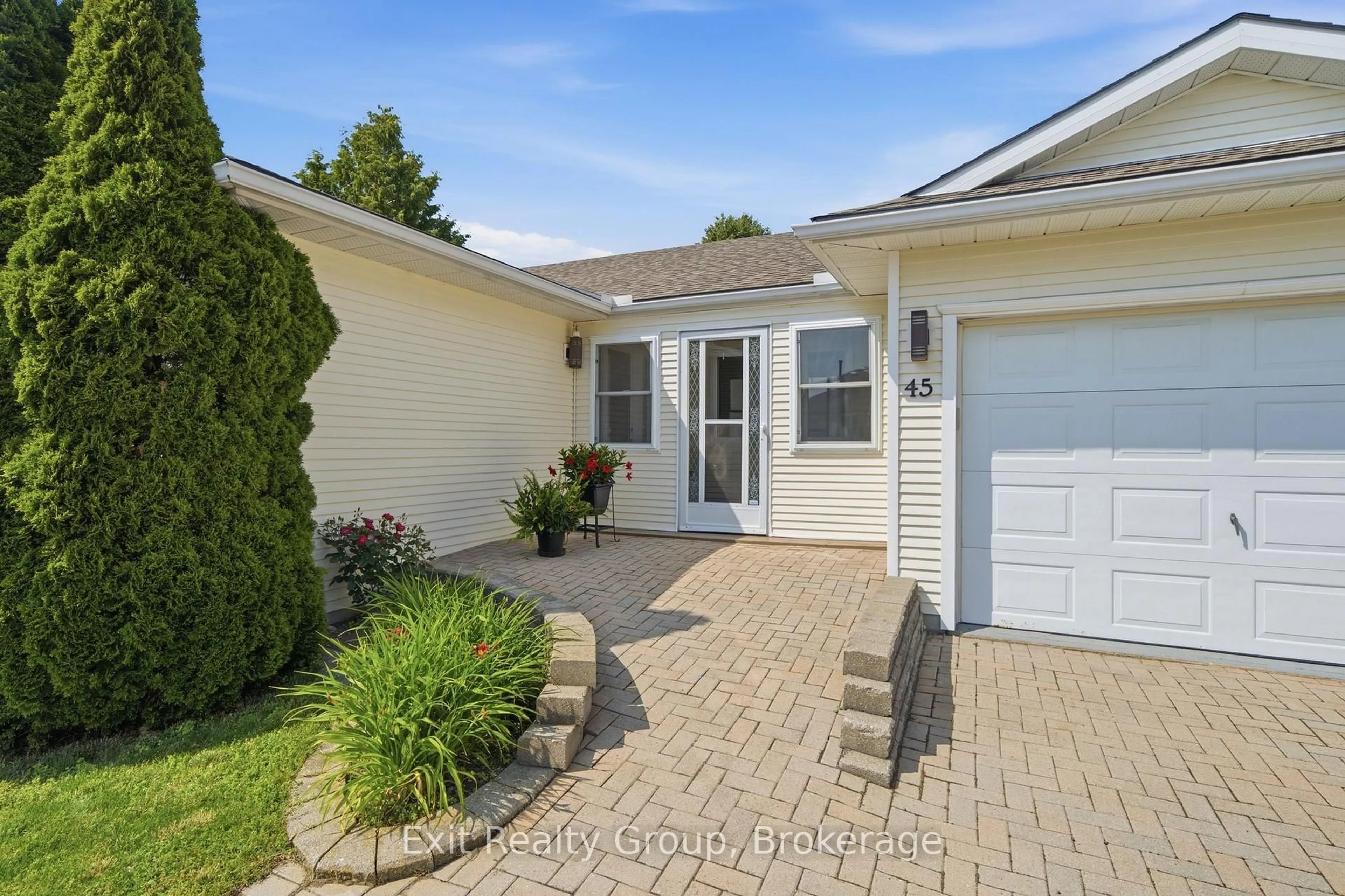 Home with vinyl exterior material, street for 45 Heritage Dr, Prince Edward County Ontario K0K 3L0