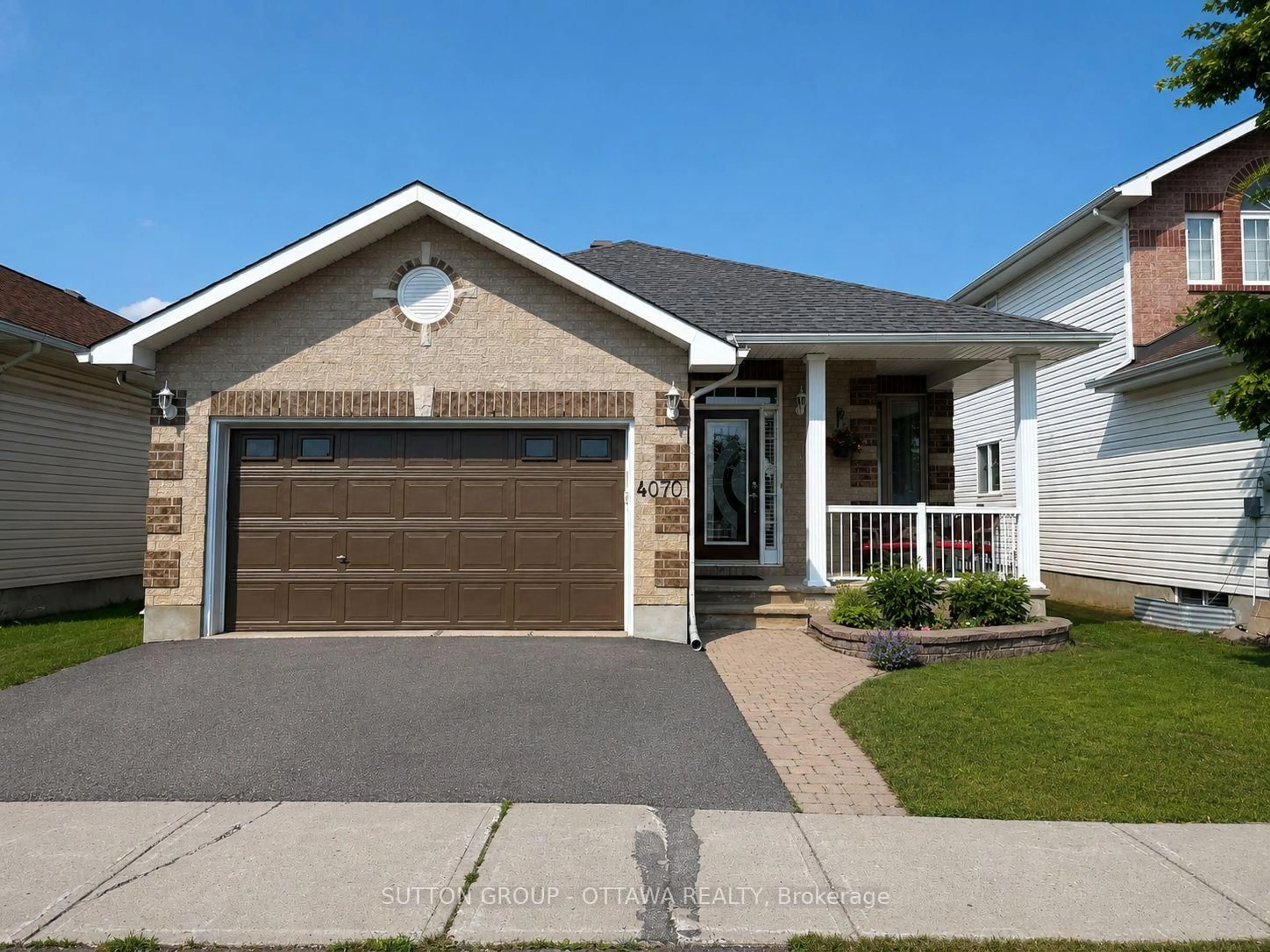 Home with vinyl exterior material, street for 4070 Canyon Walk Dr, Ottawa Ontario K1V 1W4