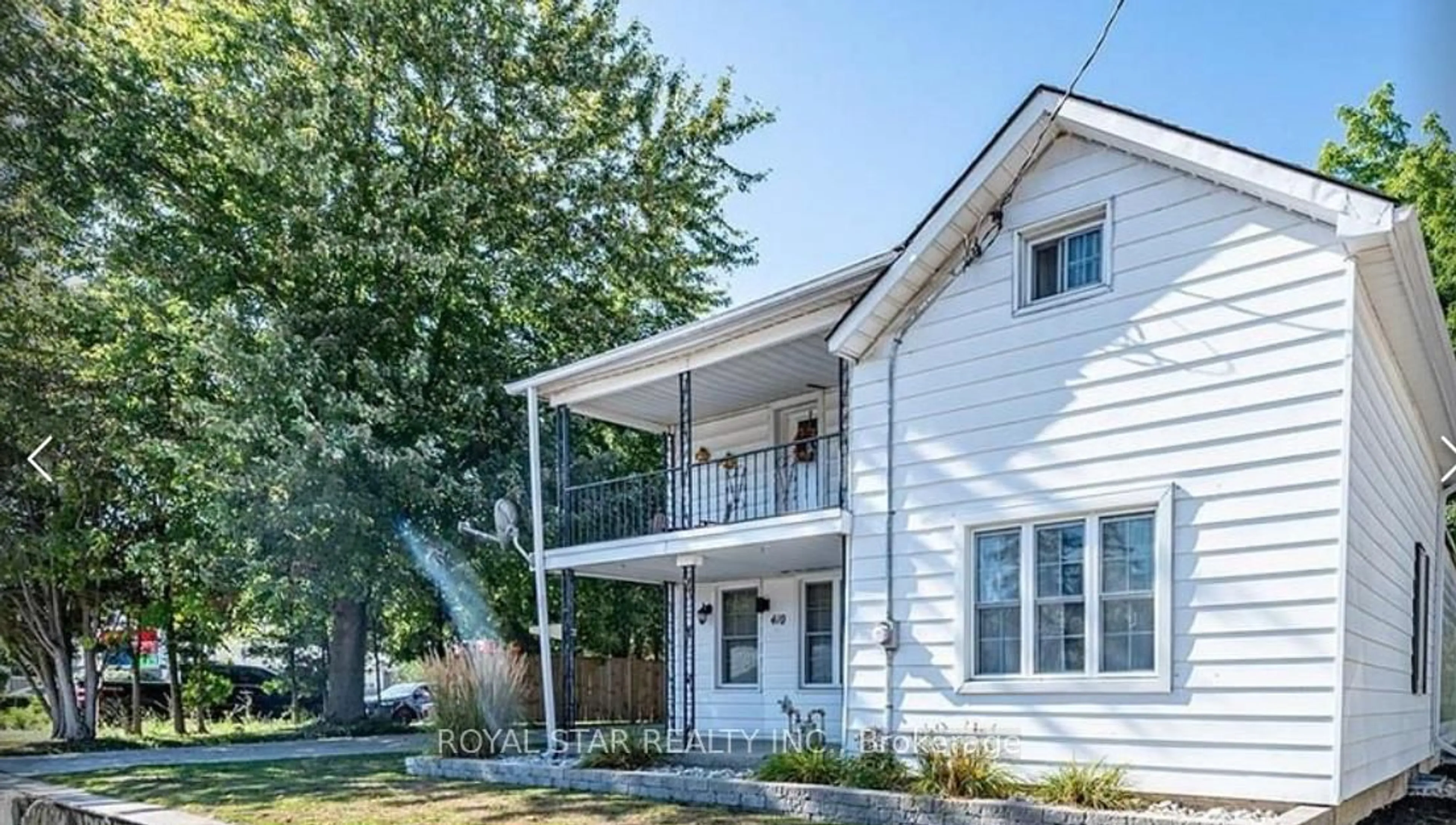 Home with vinyl exterior material, street for 410 Main St, Norwich Ontario N0J 1X0