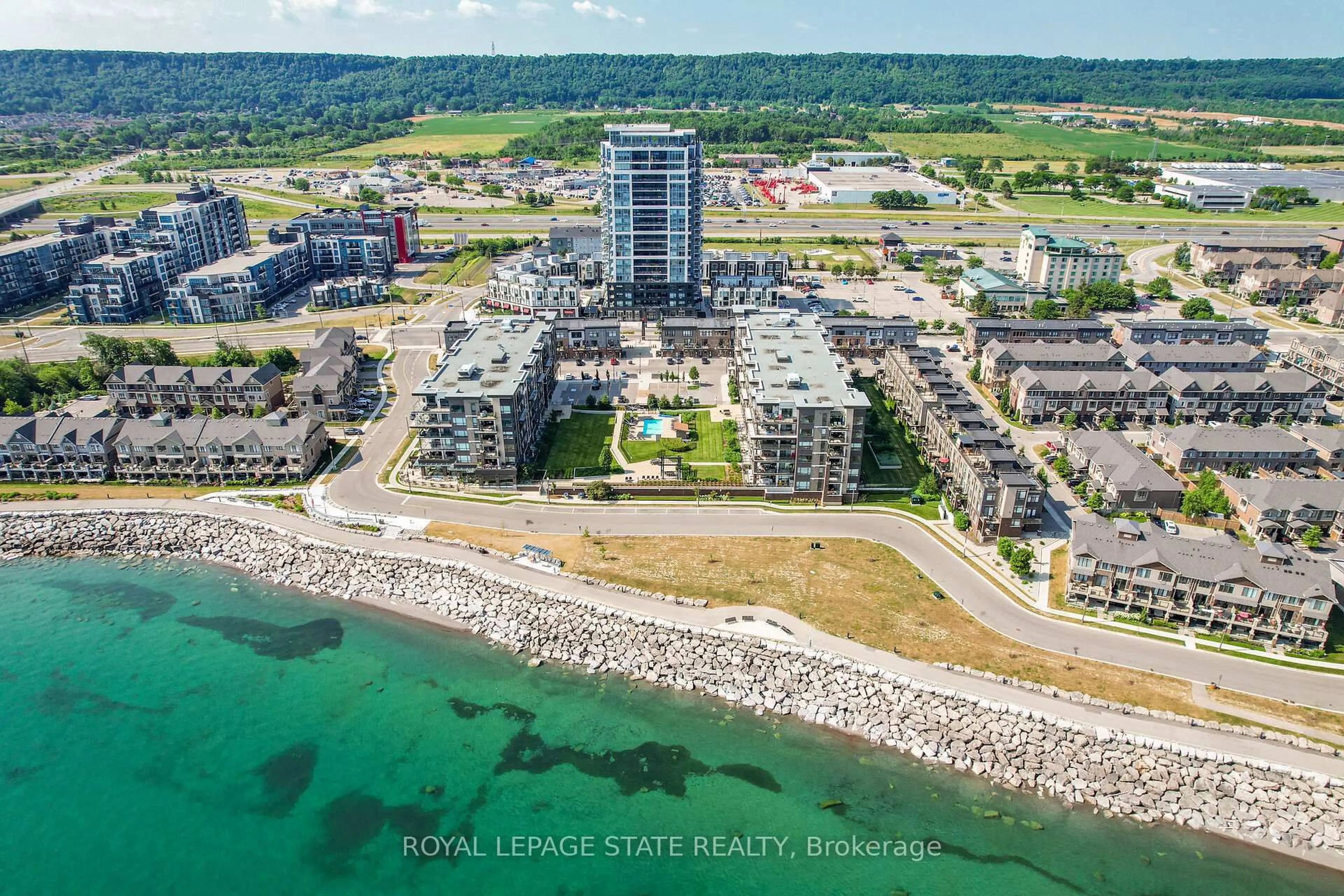 A pic from outside/outdoor area/front of a property/back of a property/a pic from drone, water/lake/river/ocean view for 40 Esplanade Lane #206, Grimsby Ontario L3M 0G9