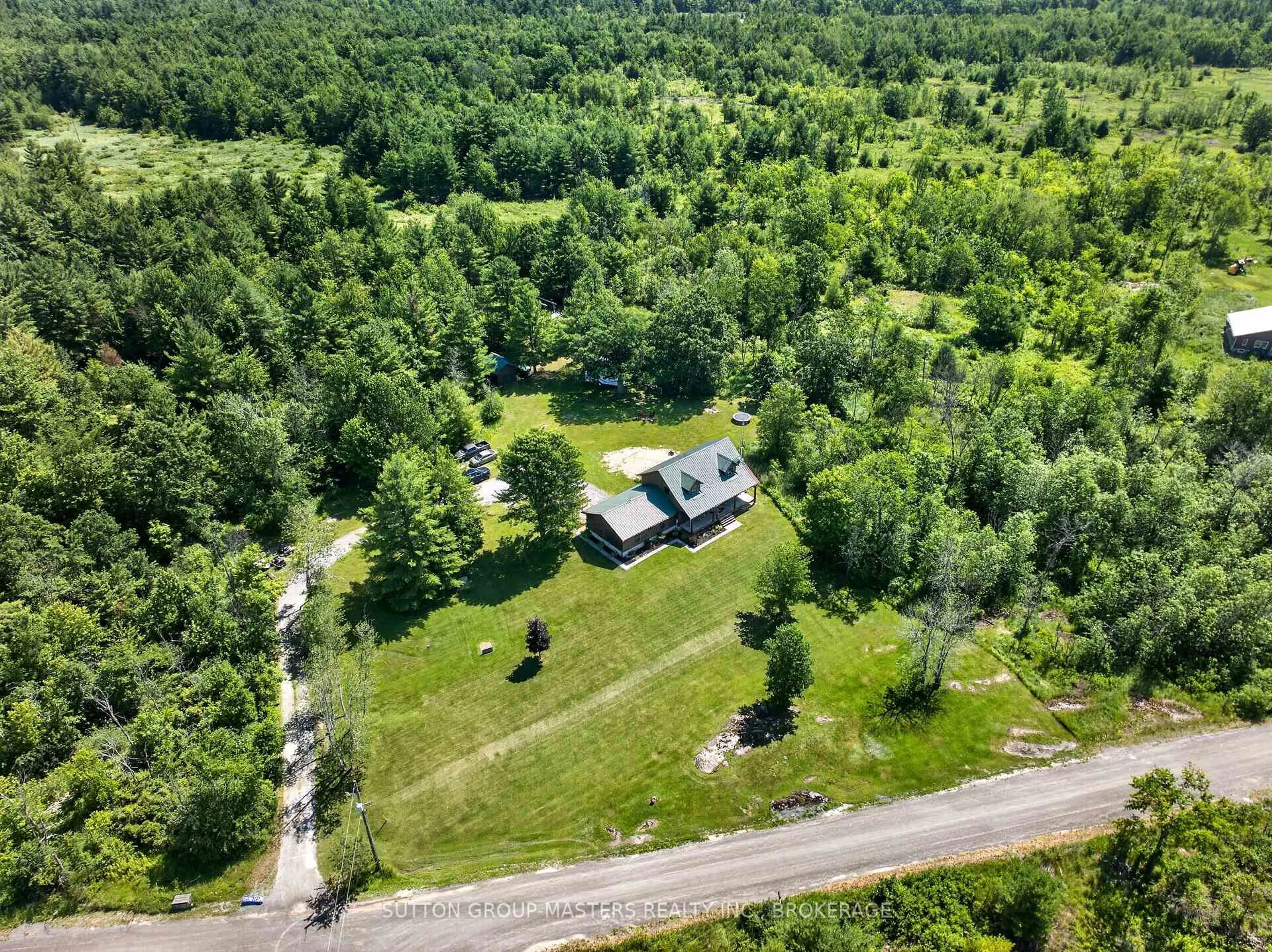 A pic from outside/outdoor area/front of a property/back of a property/a pic from drone, forest/trees view for 6716 Leveque Rd, Kaladar Ontario K0K 1Z0