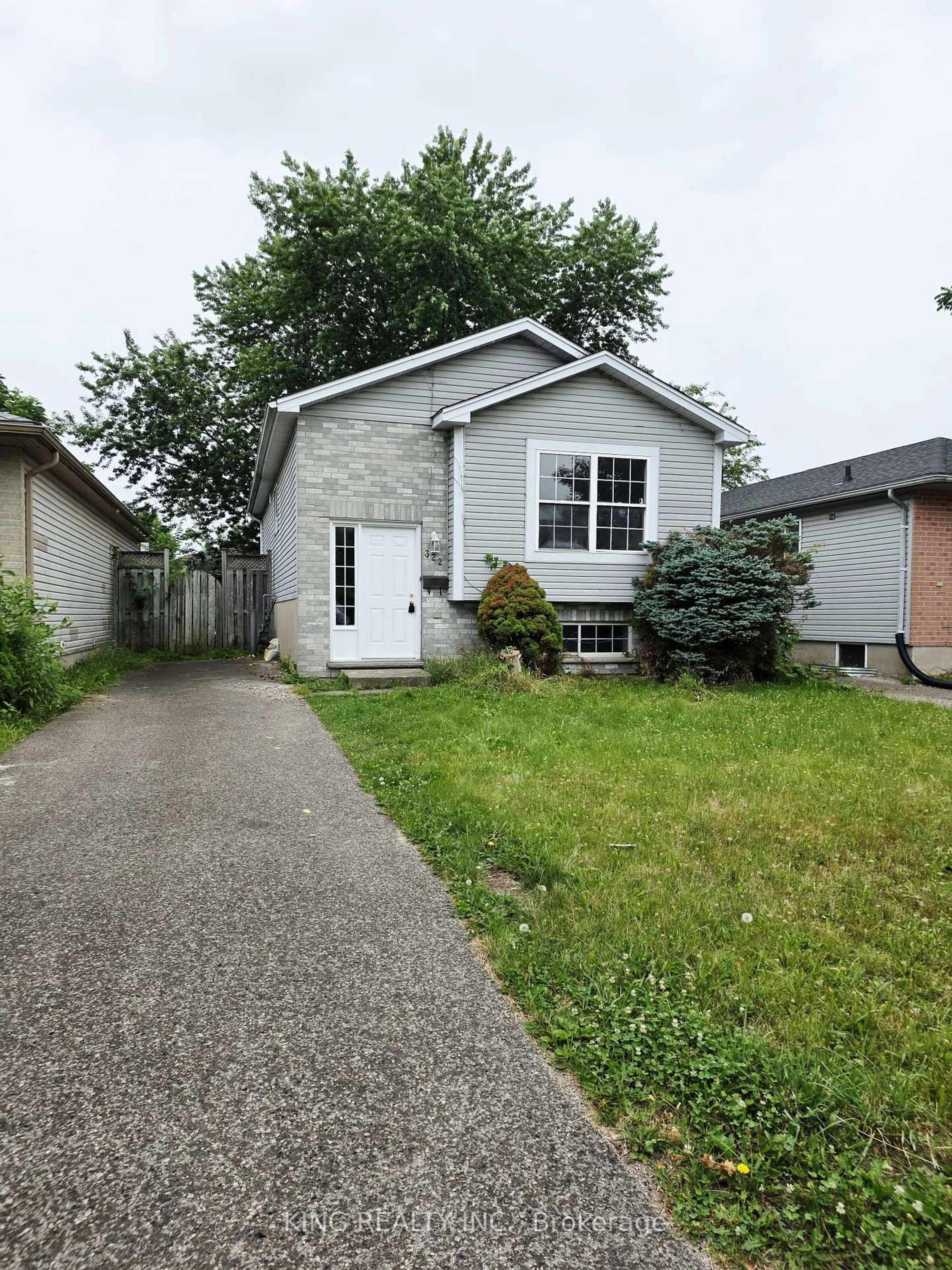 Home with vinyl exterior material, street for 322 FLEMING Dr, London East Ontario N5V 4Y6