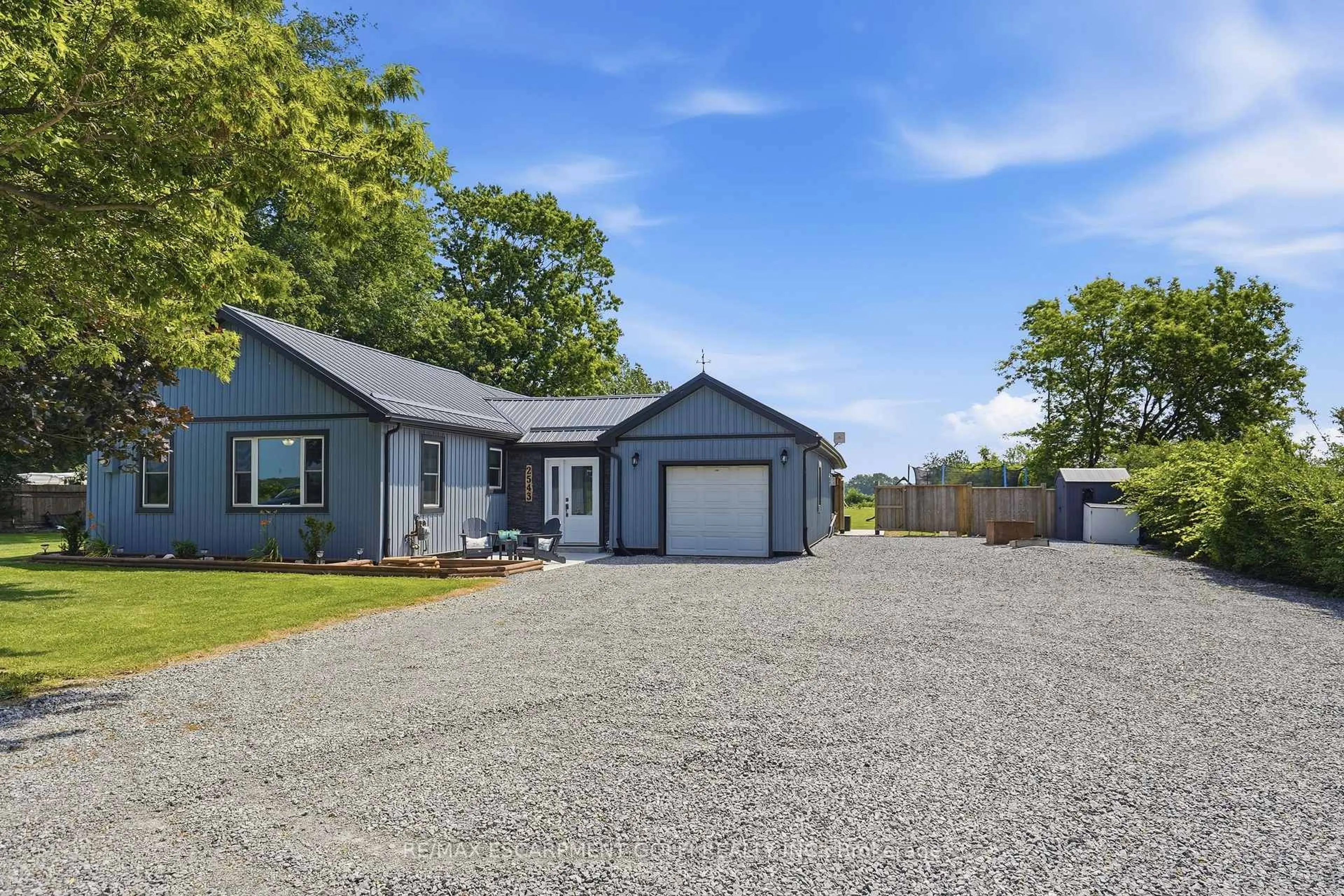 Home with vinyl exterior material, street for 2543 Miller Rd, Port Colborne Ontario L3K 5V5