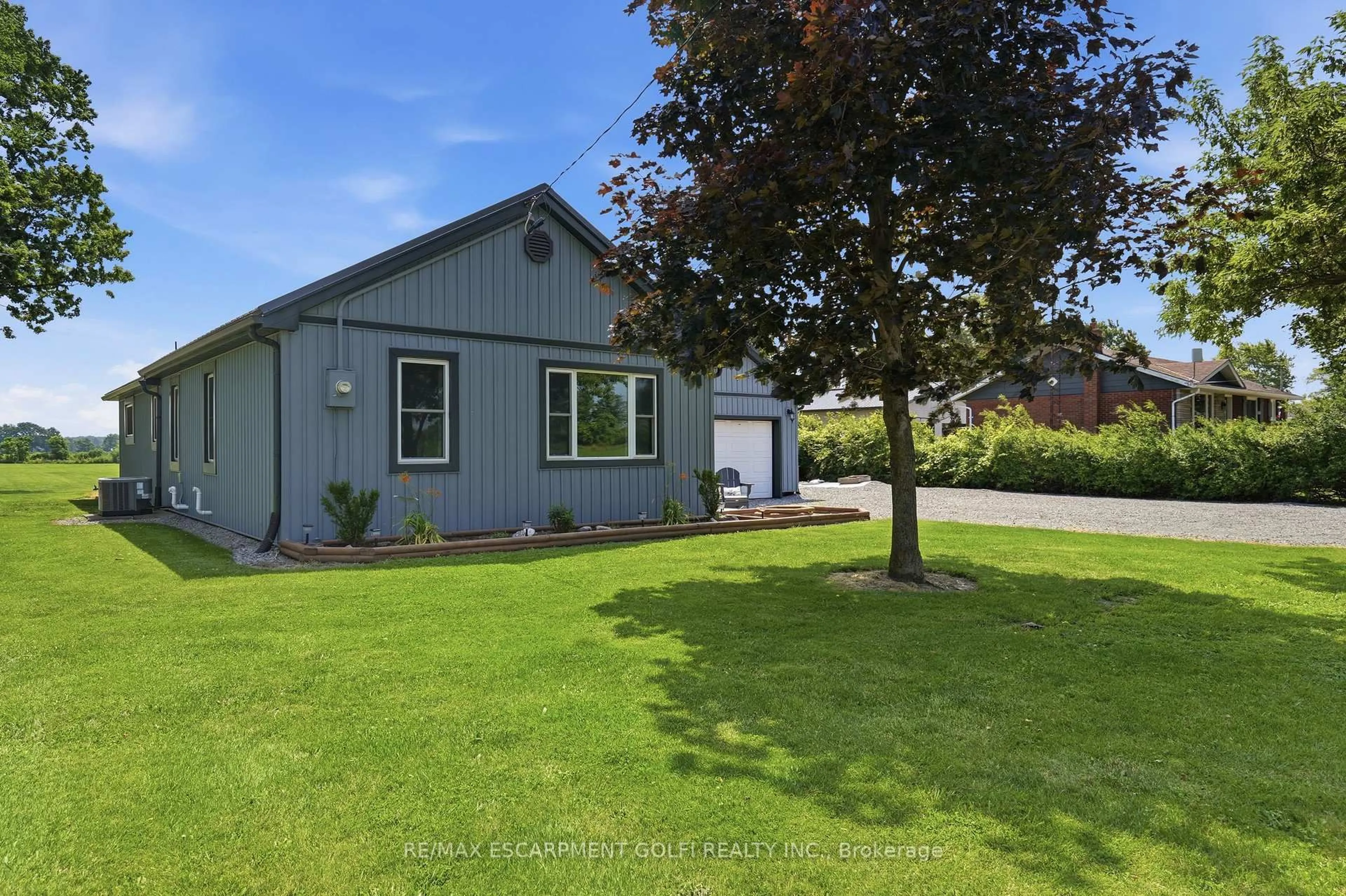 A pic from outside/outdoor area/front of a property/back of a property/a pic from drone, street for 2543 Miller Rd, Port Colborne Ontario L3K 5V5