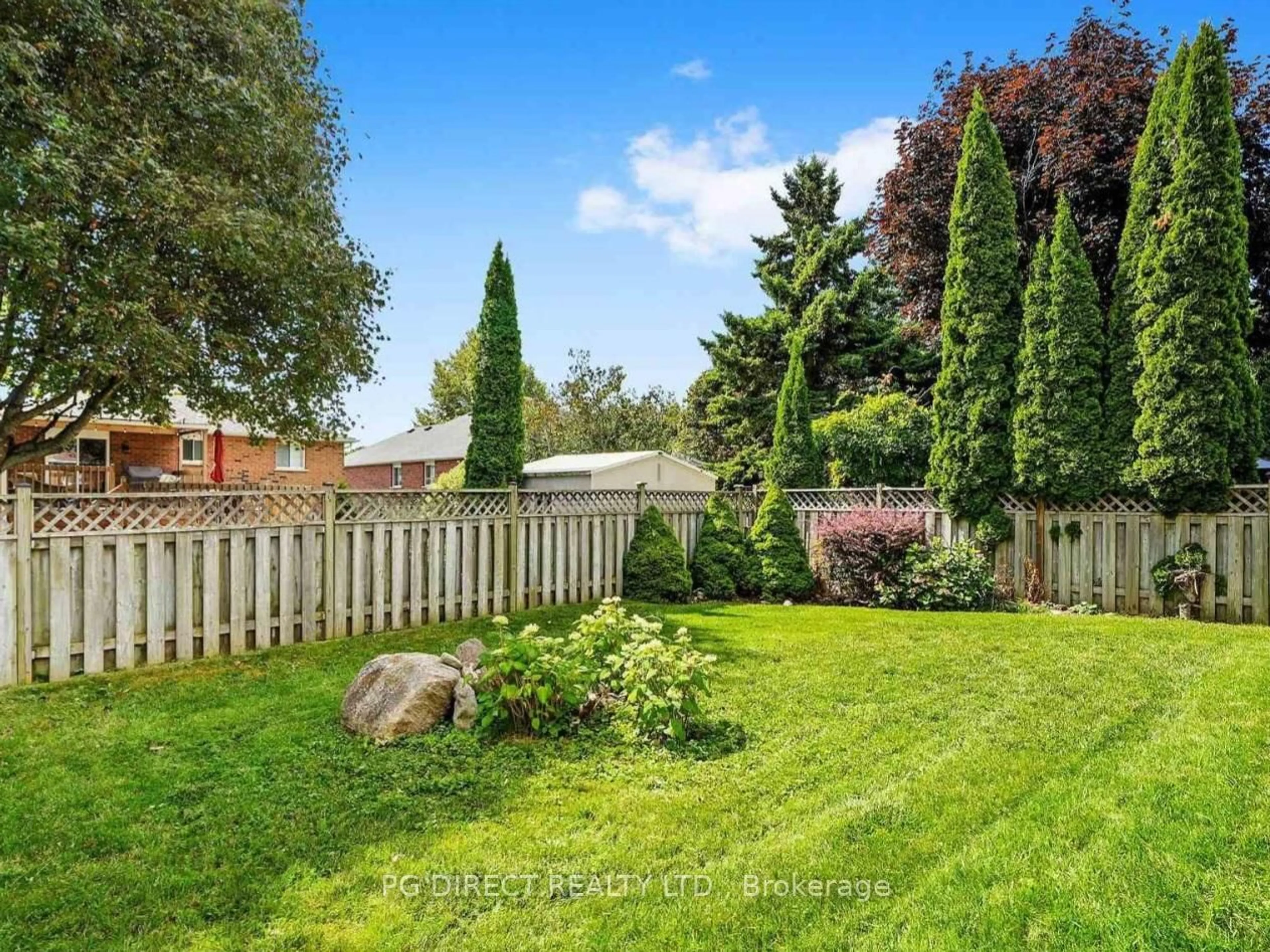 A pic from outside/outdoor area/front of a property/back of a property/a pic from drone, forest/trees view for 519 Wilson Rd, Cobourg Ontario K9A 5P7