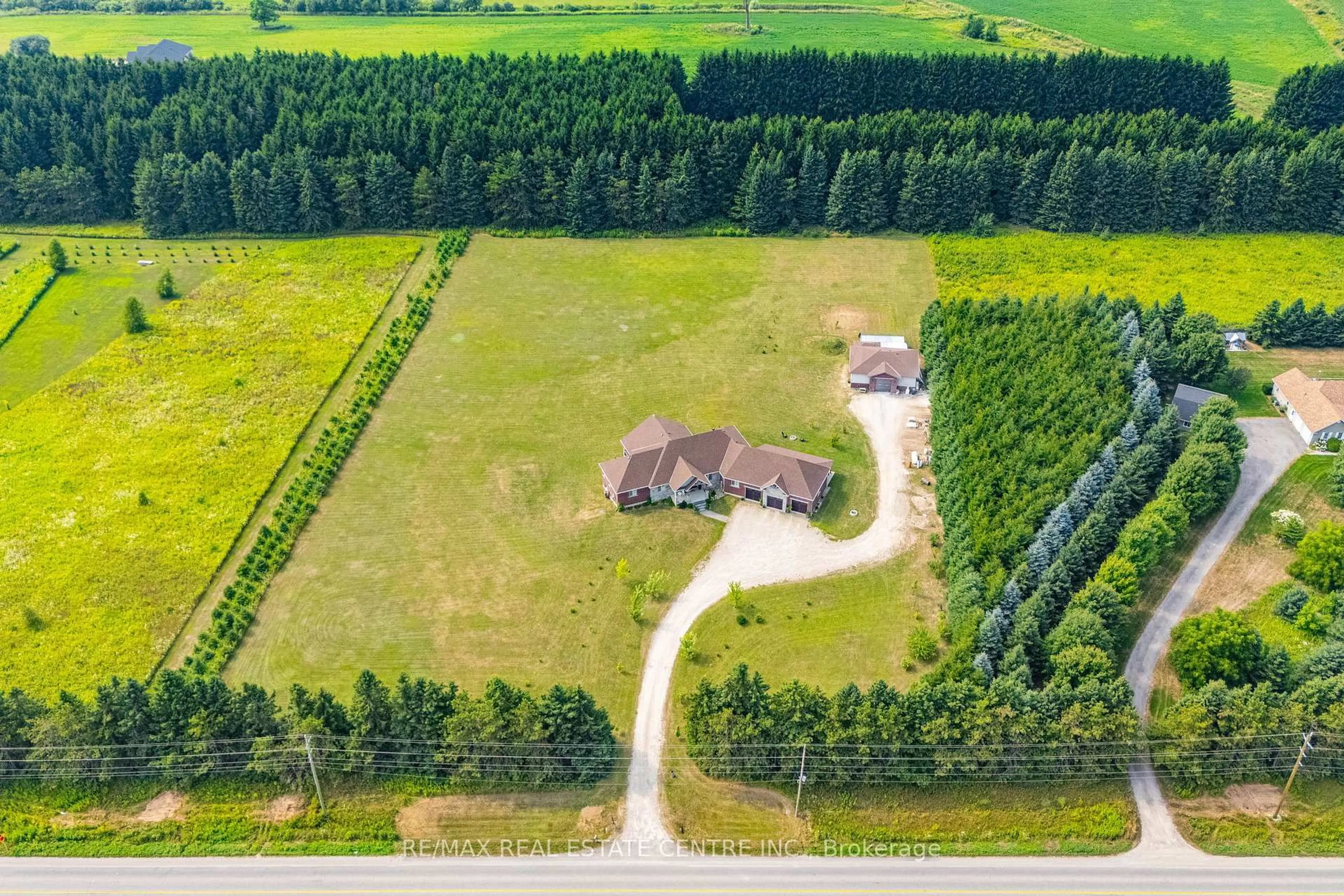 A pic from outside/outdoor area/front of a property/back of a property/a pic from drone, forest/trees view for 023181 Erin East Garafraxa Townline, East Garafraxa Ontario L9W 7G8