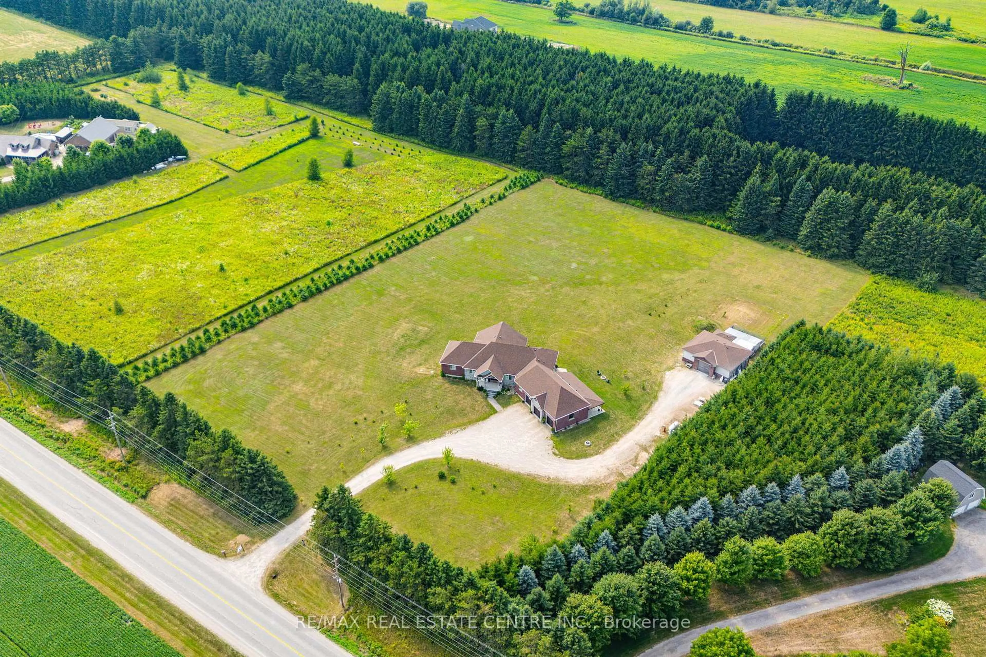 A pic from outside/outdoor area/front of a property/back of a property/a pic from drone, forest/trees view for 023181 Erin East Garafraxa Townline, East Garafraxa Ontario L9W 7G8
