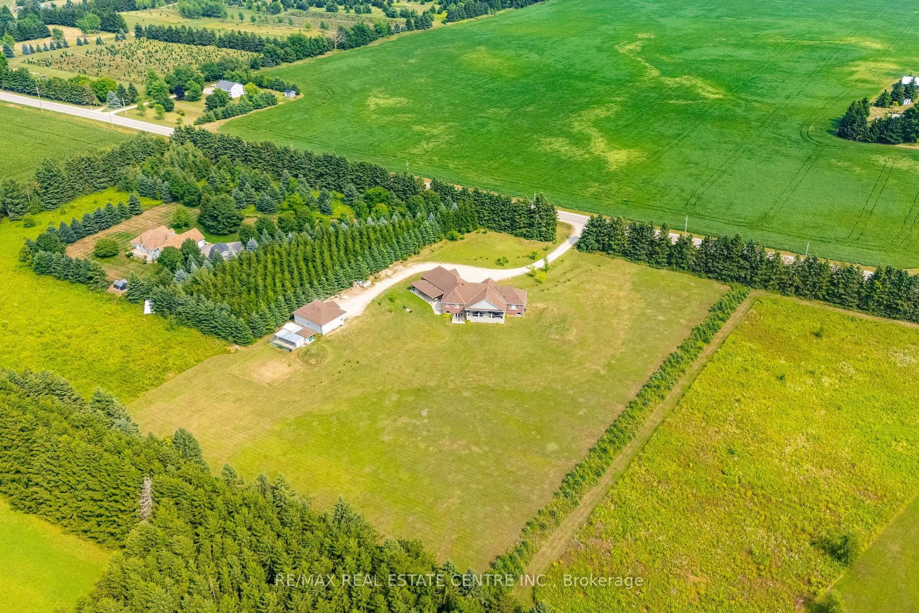 A pic from outside/outdoor area/front of a property/back of a property/a pic from drone, forest/trees view for 023181 Erin East Garafraxa Townline, East Garafraxa Ontario L9W 7G8