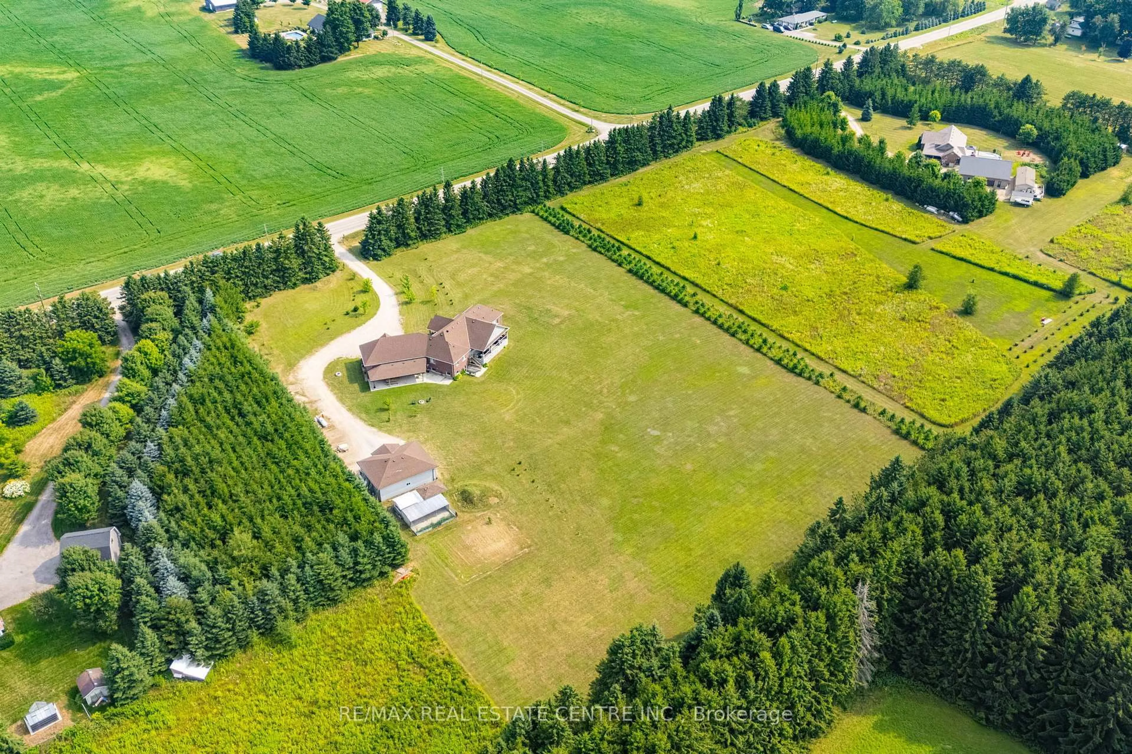 A pic from outside/outdoor area/front of a property/back of a property/a pic from drone, forest/trees view for 023181 Erin East Garafraxa Townline, East Garafraxa Ontario L9W 7G8