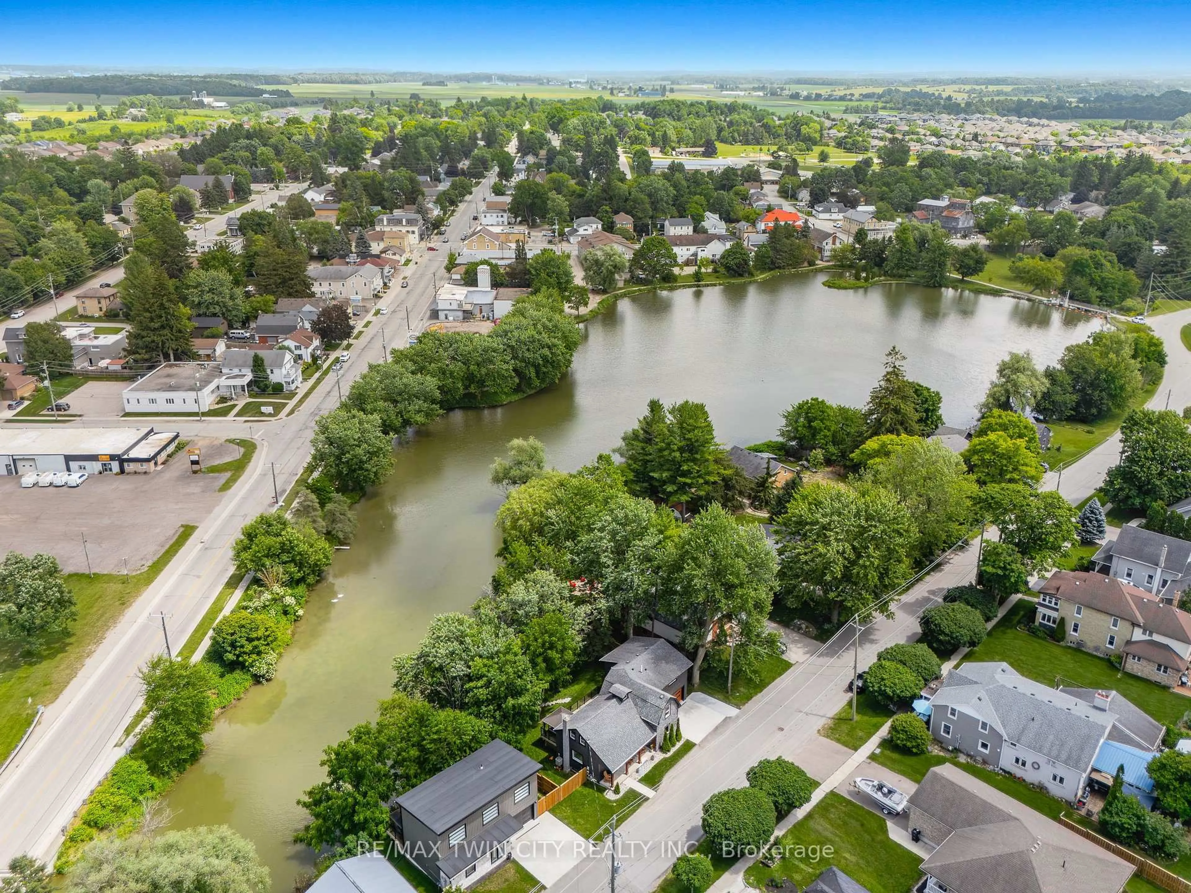 A pic from outside/outdoor area/front of a property/back of a property/a pic from drone, water/lake/river/ocean view for 20 David St, Wellesley Ontario N0B 2T0
