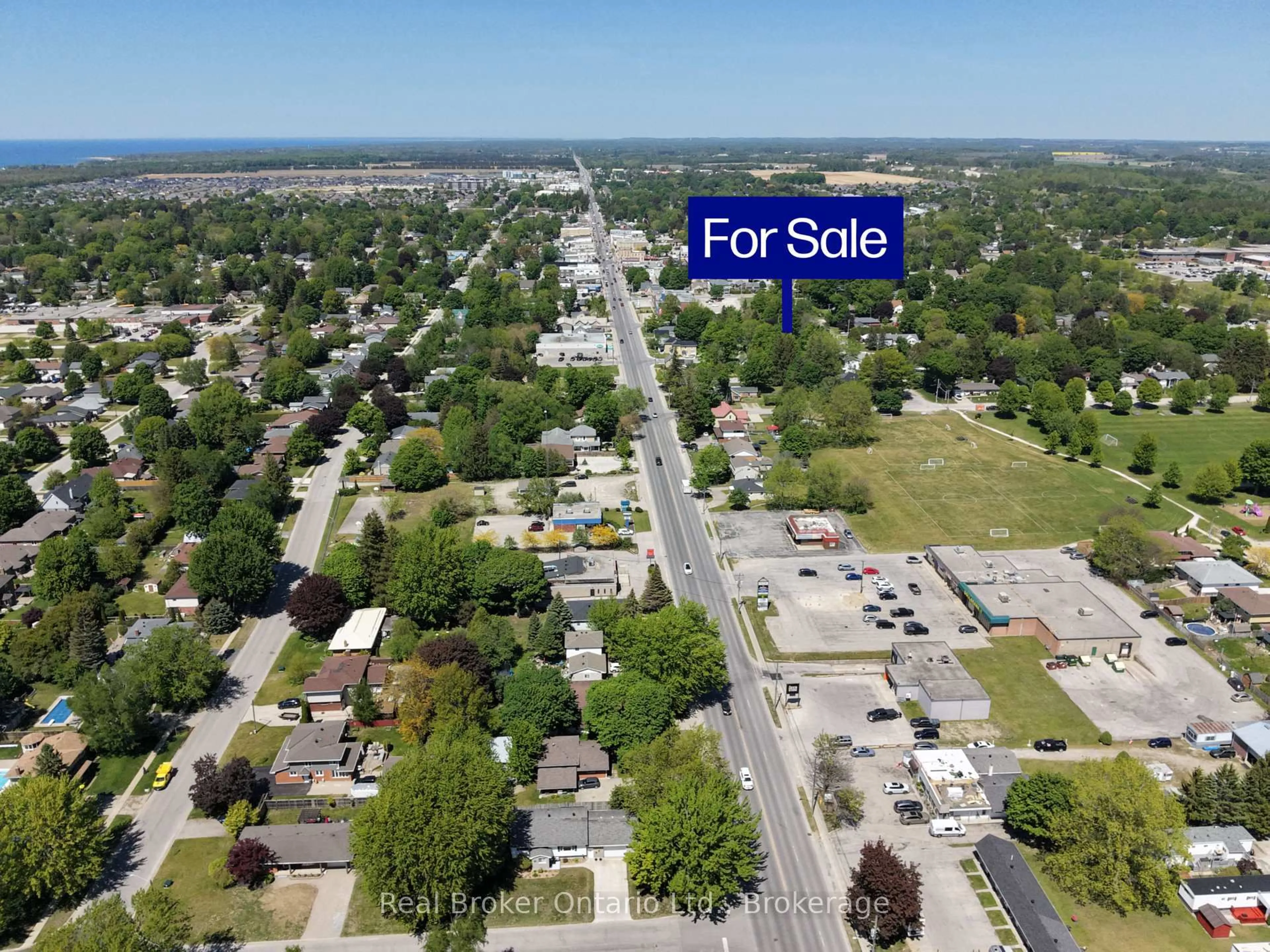A pic from outside/outdoor area/front of a property/back of a property/a pic from drone, street for 617 Louis St, Saugeen Shores Ontario N0H 2C4