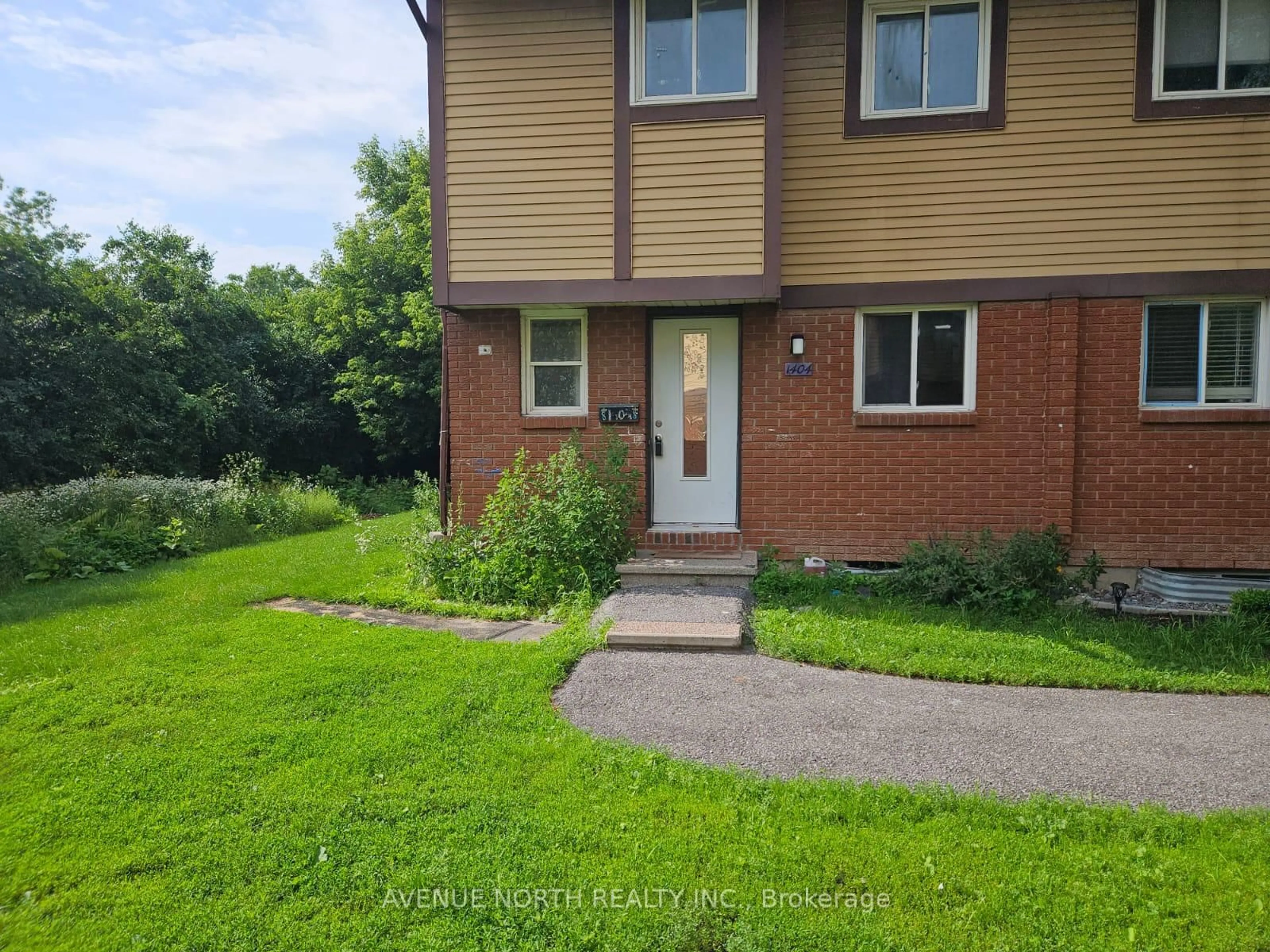 A pic from outside/outdoor area/front of a property/back of a property/a pic from drone, street for 1404 Foxwell St #1, Ottawa Ontario K1B 5J4