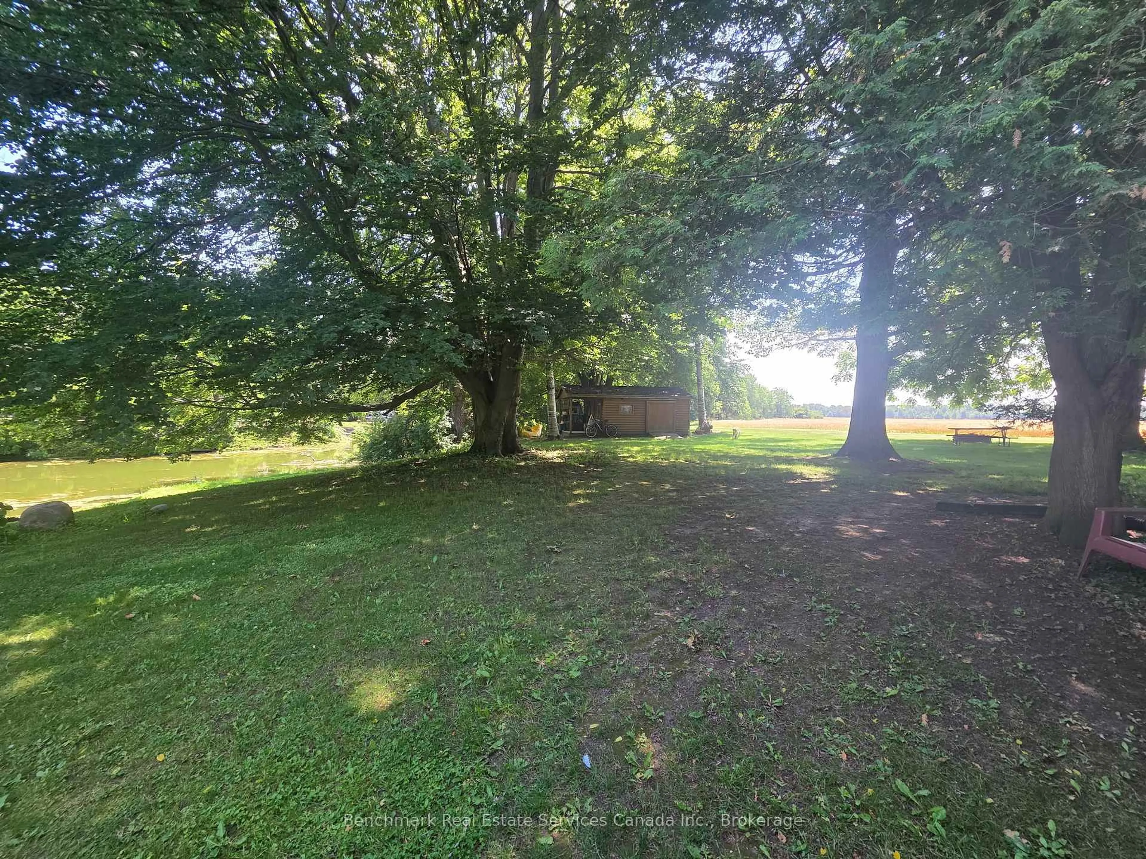 A pic from outside/outdoor area/front of a property/back of a property/a pic from drone, forest/trees view for 4247 Perth 9 Line, Perth South Ontario N4X 1C5