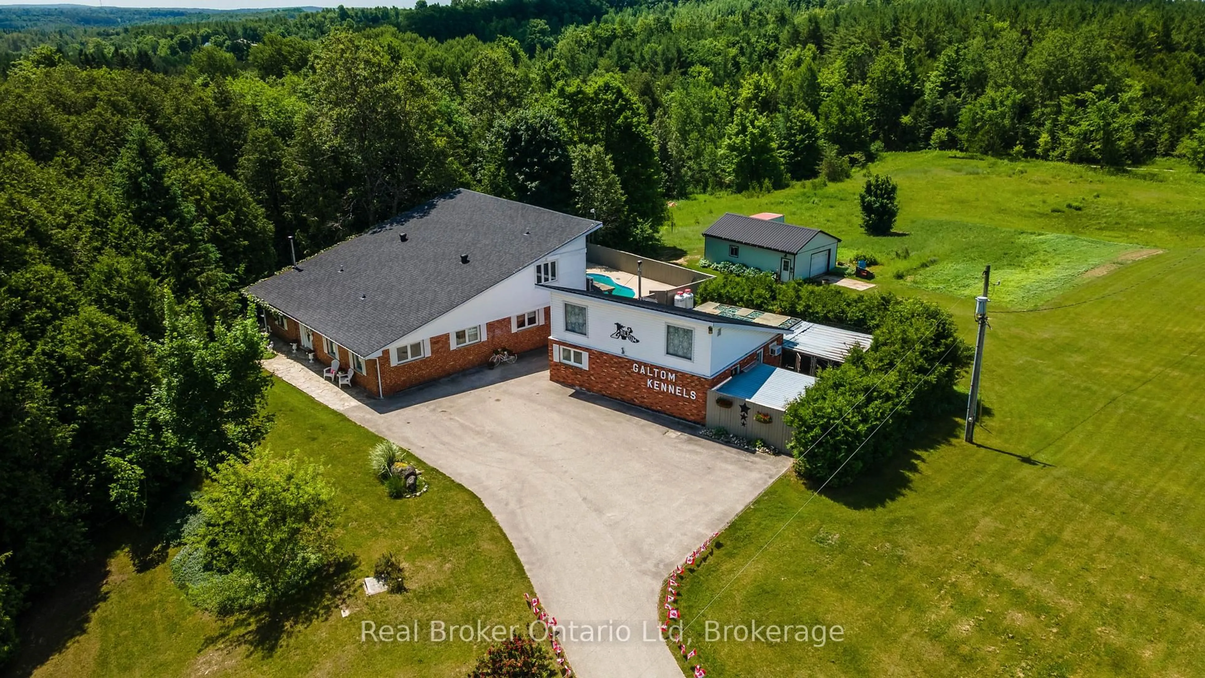A pic from outside/outdoor area/front of a property/back of a property/a pic from drone, unknown for 775498 HWY 10 Highway, West Grey Ontario N0C 1H0