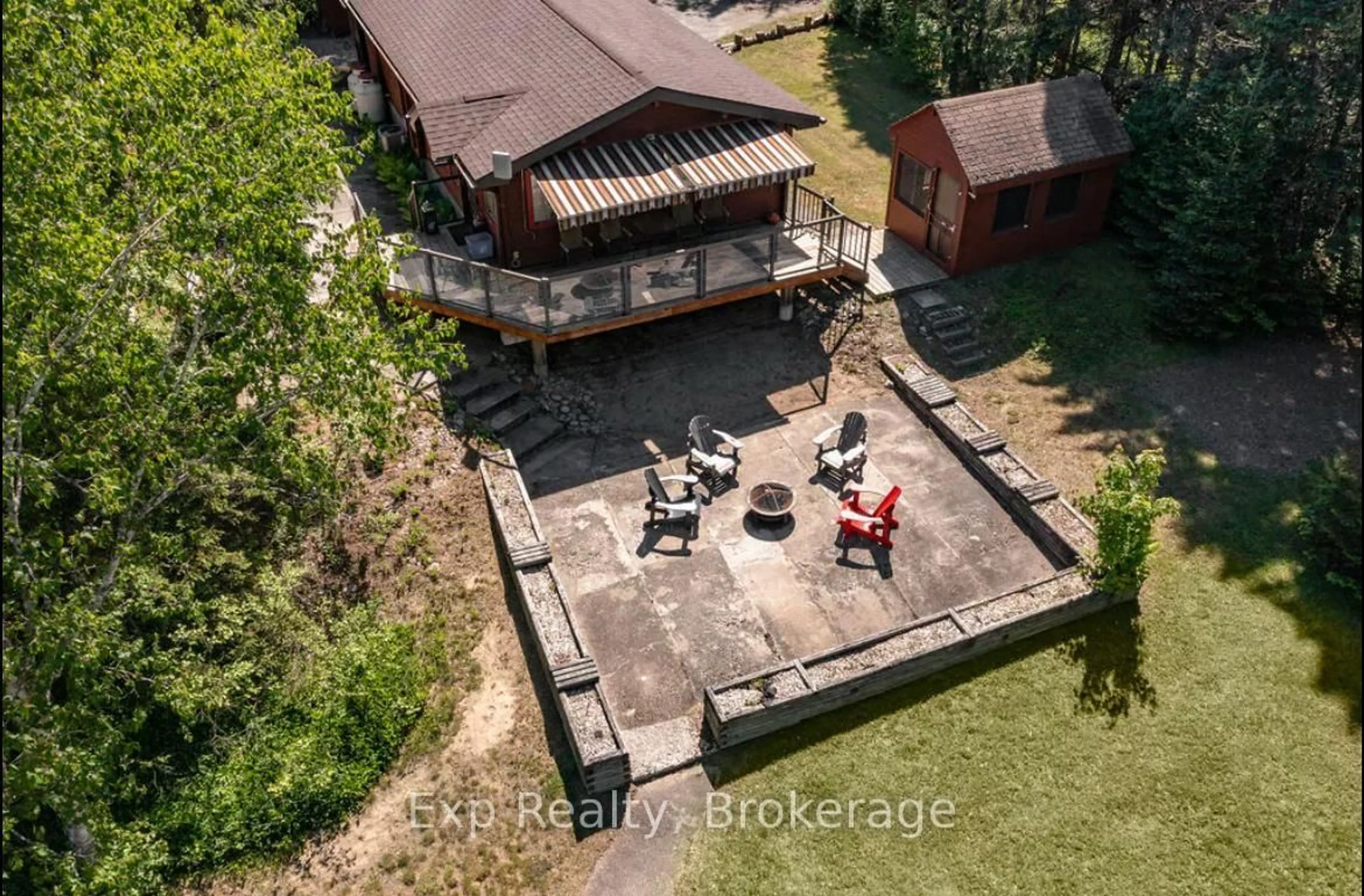 A pic from outside/outdoor area/front of a property/back of a property/a pic from drone, unknown for 27 Groeger Rd, Huntsville Ontario P1H 2J4