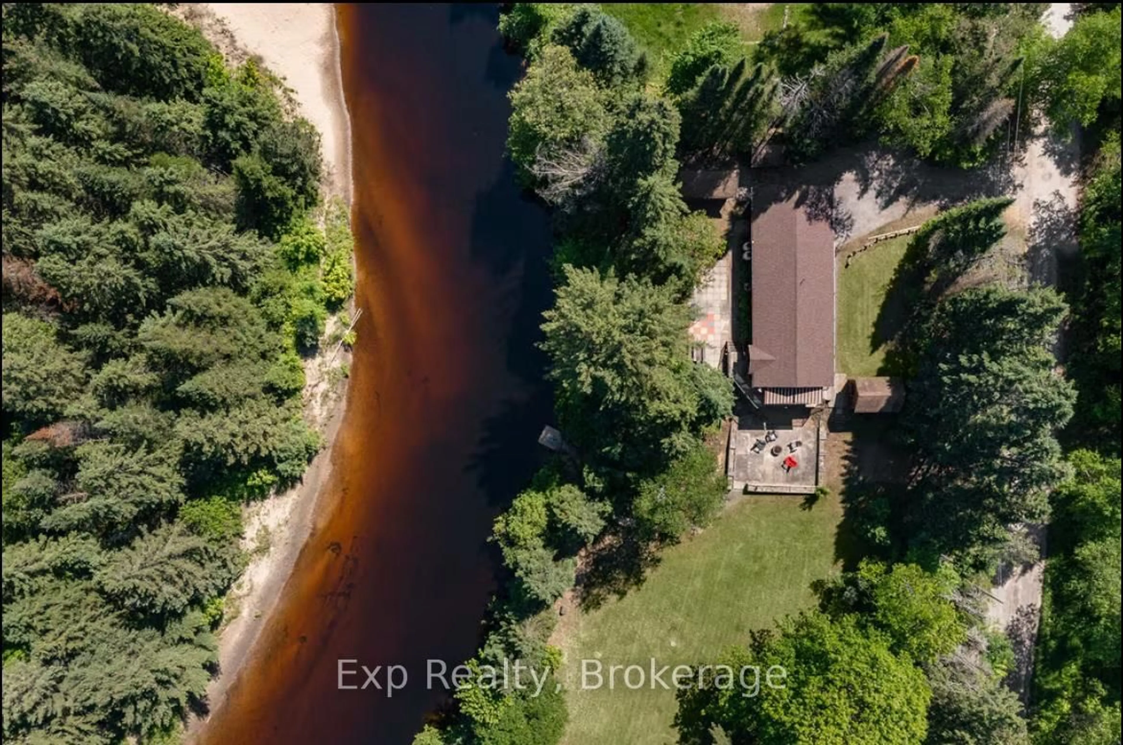 A pic from outside/outdoor area/front of a property/back of a property/a pic from drone, water/lake/river/ocean view for 27 Groeger Rd, Huntsville Ontario P1H 2J4