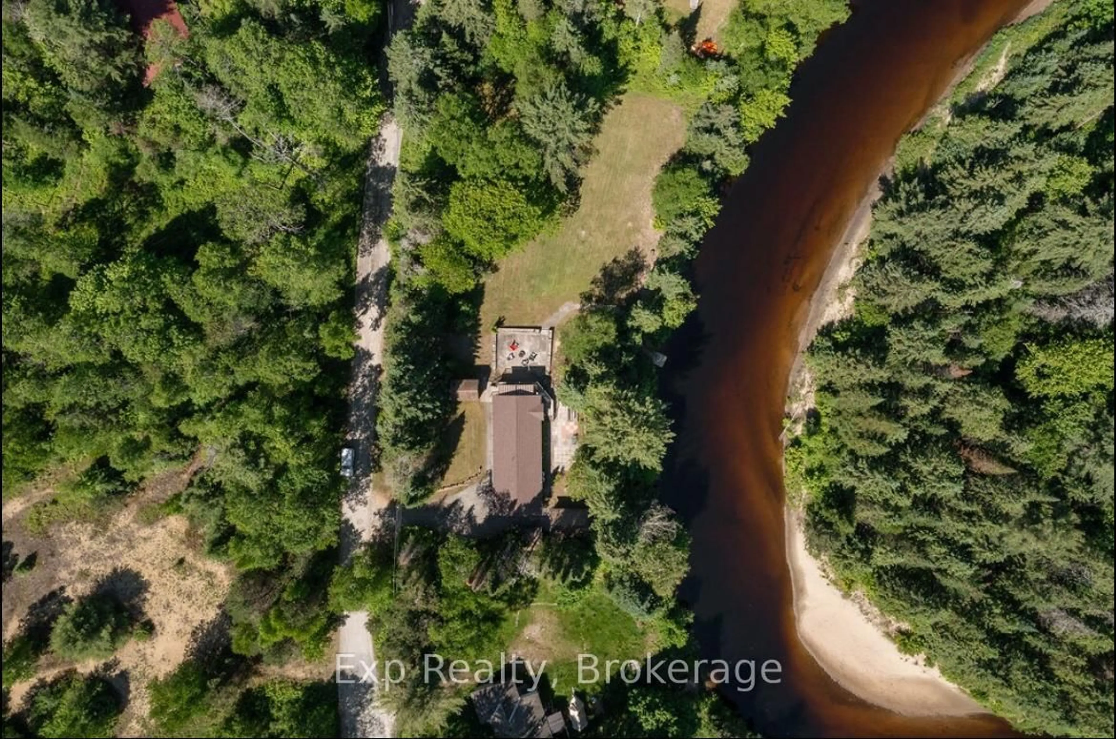 A pic from outside/outdoor area/front of a property/back of a property/a pic from drone, water/lake/river/ocean view for 27 Groeger Rd, Huntsville Ontario P1H 2J4